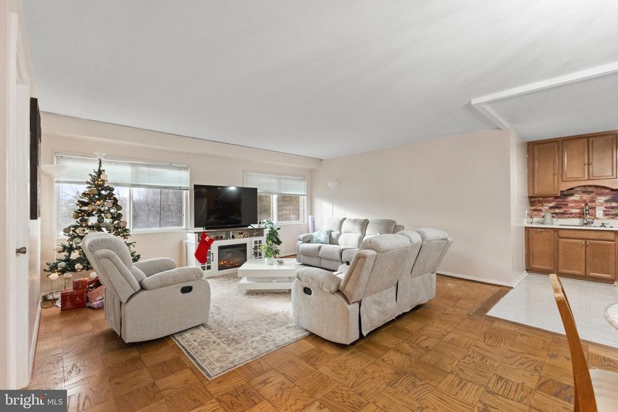 Welcome to this bright and well-maintained 2-bedroom, 1-bath condo in the desirable University Towers community of Silver Spring. Featuring a spacious, sun-filled layout, this home offers comfortable living with flexibility for both everyday life and entertaining.

The unit showcases hardwood and parquet flooring throughout the main living areas, a generous living and dining combination, and an updated kitchen with modern cabinetry and stainless steel appliances. Both bedrooms are well-sized with ample closet space, while the updated bathroom features tasteful finishes and a marble-topped vanity. 

The condo fee includes all utilities! This secure, amenity-rich building offers elevator access, an outdoor swimming pool, tennis courts, a party room, on-site management, and unassigned parking.

Ideally located with a bus stop directly in front of the building and easy access to Metro, shopping, dining, and major commuter routes. Deadline for offers will be Sunday 1/25 at 3pm.