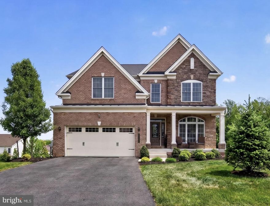 Welcome to 11003 Sweet Apple Court, a stunning Toll Brothers Woodstock model nestled on a prime cul-de-sac lot in the highly-sought after Marlboro Ridge Community. Built in 2020 and offering over 5,270 square feet of thoughtfully designed living space, this exceptional home features 5 bedrooms, 4 full bathrooms, and 1 half bath, blending luxury, comfort, and modern functionality.

Step inside to discover an open and elegant layout highlighted by hardwood flooring throughout the main level and upstairs landing, a private office with a beautiful bay window, and a built-in mudroom for everyday convenience. The heart of the home is the impressive Palladium kitchen, complete with upgraded KitchenAid appliances, an enhanced sink, built-in ceiling speakers, and a spacious walk-in pantry. The expansive bump-outs and extensions along the rear of the home create a light-filled environment perfect for both entertaining and everyday living, seamlessly connecting to the all-seasons screened-in deck.

Upstairs, retreat to the luxurious primary suite featuring a vaulted ceiling, upgraded carpet, spa-like bath with enhanced plumbing features, and a custom walk-in closet. Additional highlights include a princess suite with its own private bathroom, a walk-in laundry room, and an extra-large linen closet for added storage.

The fully finished basement offers incredible versatility with open, pillar-free space, a large storage closet, and a dedicated gym that can easily be converted into a home theater. An extended garage, upgraded front door with beveled glass, and an advanced HVAC system with an integrated air cleaner further elevate this home’s appeal.

Perfectly positioned in a premier Upper Marlboro community, this home offers the ideal combination of luxury, space, and location. Don’t miss the opportunity to own this beautifully upgraded, move-in-ready residence.