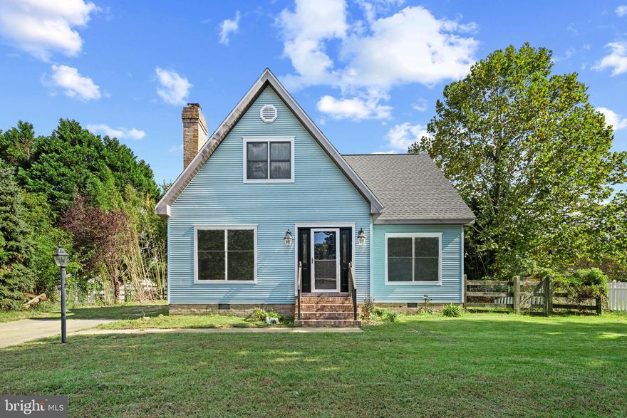 With its cheerful blue siding and classic brick steps, this unique gem is just waiting for your personal touch. The home instantly catches the eye and welcomes you inside, where a thoughtfully designed layout blends comfort and function.

The spacious living room sets the tone with a cozy brick wood-burning fireplace, perfect for gathering on chilly evenings. From here, the flow carries easily into the kitchen, where white soft-close cabinetry with modern black hardware includes a convenient Lazy Susan for added storage and function. New granite countertops, updated fixtures, and a pantry provide both style and practicality, while a sunny breakfast nook bump-out creates the ideal spot for morning coffee. Just off the kitchen, you’ll find a convenient powder room and laundry room with direct access to the freshly painted rear deck—ready for summer cookouts or quiet afternoons.

The first-floor primary suite offers privacy and ease, complete with a large walk-in closet and an en suite bath featuring a jetted soaking tub and separate shower. Upstairs, brand-new laminate plank flooring gives each bedroom a fresh, modern touch. The full hall bath has been updated with new flooring, a new tub and surround, a sleek vanity with black hardware, and new faucets. The seller also plans to replace the upstairs ceiling fans, ensuring added comfort.

Additional upgrades throughout the home include new fixtures, ceiling fans, a new back door, a brand-new roof, and new insulation in the crawlspace.

Outside, the mostly fenced backyard offers room to relax or play, complemented by a handy storage shed. And with no HOA fees, you’ll enjoy added freedom and flexibility.

Ideally situated just a short drive from downtown restaurants, shops, Salisbury University, and the picturesque Wicomico River, this home offers both convenience and charm. Brimming with potential and filled with thoughtful updates, 313 W London Ave is ready for its next chapter. Don’t miss the chance to make it yours!