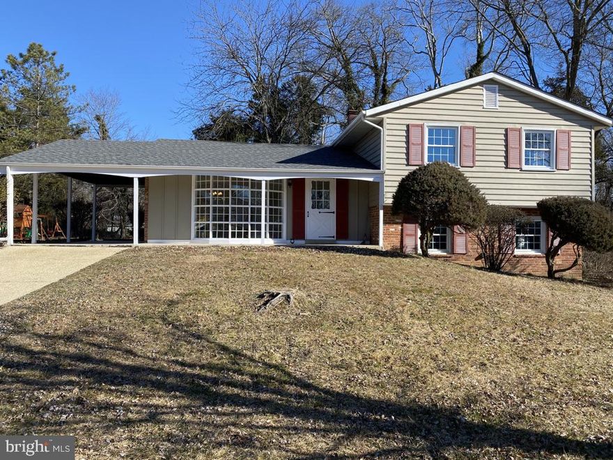 Immaculate split-level home on a large corner lot.  This well-kept 3 bedroom, 2 full bath home has a brand new roof and is freshly painted inside and out...move-in ready!  The main level features hardwood floors and has lots of natural light with nice window features in the living room, dining room, and kitchen.  The lower level features a family room with wood beams and a fireplace for cozy family gatherings.  Workshop and lots of extra storage on the lower level as well.  Quick access to 495/95 to DC, National Harbor,  Joint Base Andrews, northern Virginia, and more.