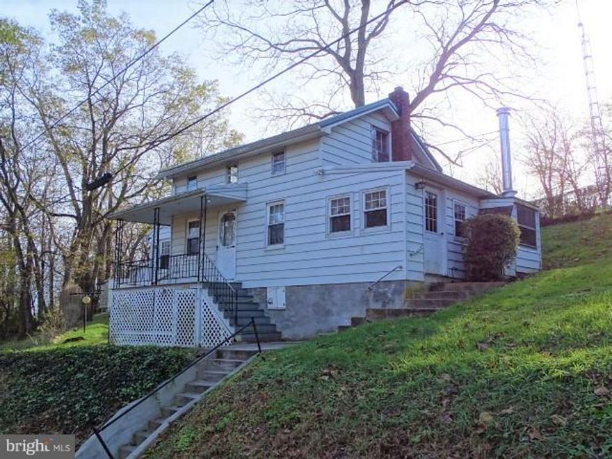 Country living with this maintained older style farmhouse on a half acre of land. Covered front porch and an enclosed porch with a wall propane heater and a wood stove. Two car canopy, replacement windows on 1st floor. Updated kitchen, full walk out basement with a 1/2 bath including a stand up shower stall plus a laundry hook up. Property is easy to show.