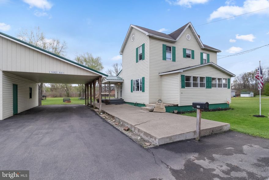 Welcome home to where life just feels… easier.  Set on a beautiful, level one-acre lot (made up of two parcels!), this home blends everyday function with the kind of charm that instantly makes you want to stay awhile.

Step inside through the perfectly designed mudroom, complete with built-in storage and conveniently located laundry (and yes… there’s room to add a future half bath if you’re thinking ahead). From there, you’re welcomed into a spacious, heart-of-the-home kitchen with an abundance of cabinetry and counter space, whether you're hosting, baking, or just enjoying a quiet morning coffee, this space delivers.

The living room is a showstopper, anchored by a stunning stone gas fireplace and complemented by a beautiful wood staircase that adds warmth and character you simply can’t replicate. Just beyond, the dining room is ready for it all holiday dinners, birthday celebrations, and those loud, laughter-filled game nights.  And that front sun porch, though it's not heated, is full of potential, think drop zone, plant haven, reading nook, or creative flex space. You’ll use it more than you think.  Upstairs offers three comfortable bedrooms and a full bath, plus a full walk-up attic giving you all the storage you could need (or future expansion potential).  But let’s talk about what really sets this property apart…  The outdoor space is next level for being so close to town.    From the carport, to the oversized heated garage/workshop (a dream setup!), to the detached two-story shed, there’s room here for hobbies, storage, business ideas, you name it.  And here’s the kicker… The additional parcel (approx. .20 acres) already has public water and sewer available (buyer to verify with Rush Township) opening the door for a tiny home, in-law suite, or income-producing opportunity.  This isn’t just a house, it’s a lifestyle upgrade with room to grow, create, and make it your own.  Don’t miss your chance, this one hits different.  Your next address is calling.