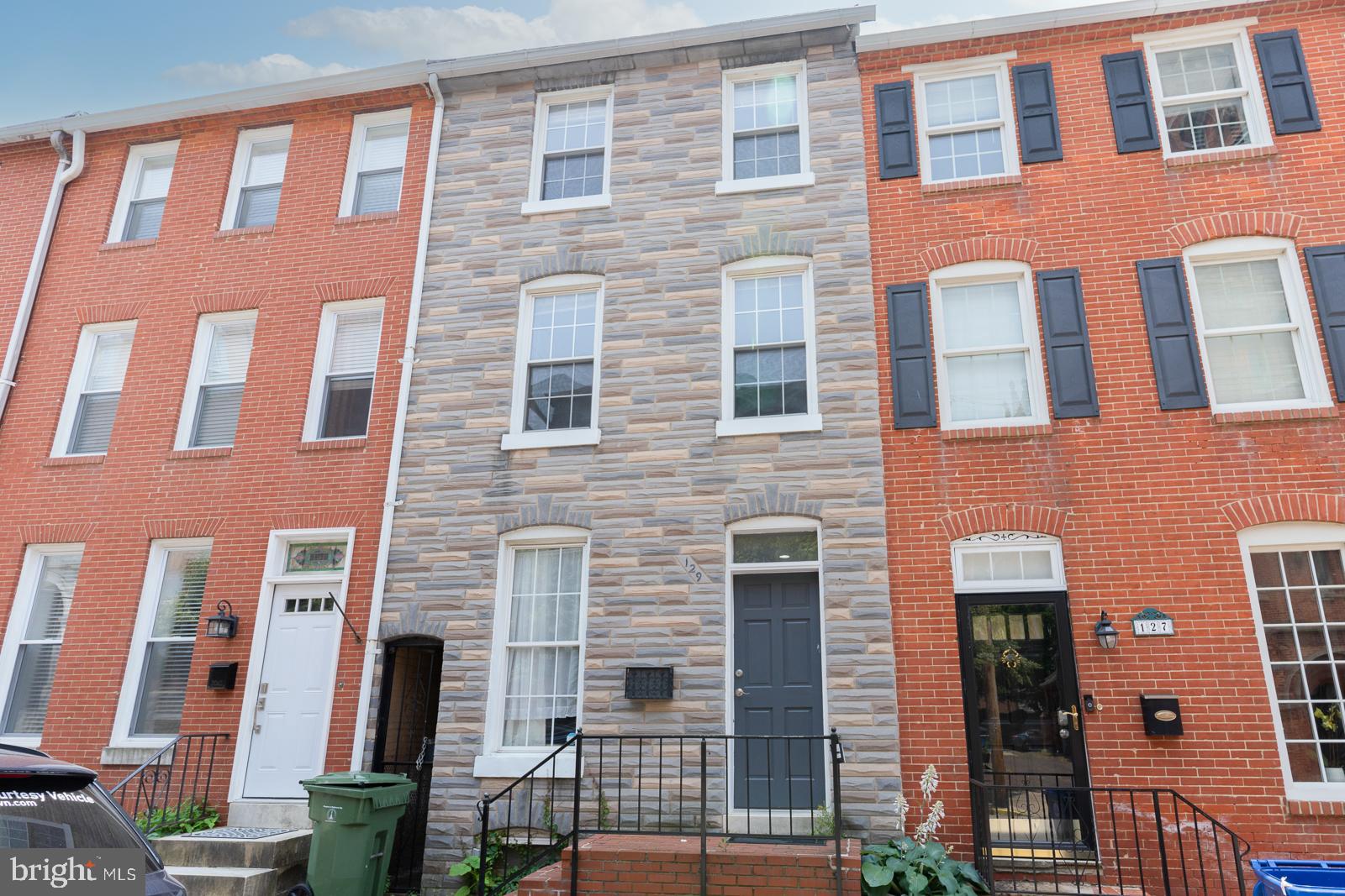 Stunning 3-Bedroom Rowhome with Deeded Garage Parking in the Heart of Federal Hill!
Welcome to your dream home in the vibrant heart of Federal Hill, just steps from Cross Street Market, restaurants, shops, and nightlife! This beautifully maintained and thoughtfully updated 3-level rowhome offers the perfect blend of historic charm and modern convenience.
Inside, you'll find 3 spacious bedrooms and 2.5 stylishly renovated bathrooms, including a luxurious top floor primary suite. The gourmet kitchen boasts sleek cabinetry, stainless steel appliances, and granite countertops—perfect for entertaining or everyday living. The updated bathrooms feature high-end finishes and designer tilework for a spa-like experience.
Enjoy the convenience of your own deeded parking space in a secure garage—a rare find in this highly sought-after neighborhood! Deeded Parking spot is in the Wall Street Garage which is conveniently located just behind the house.
Additional features include hardwood floors throughout, a sweet rear patio, and a flexible layout ideal for working from home. Plus, there's space for a rooftop deck (plans approved by city) offering potential views of the city skyline and additional outdoor space for relaxation.
This is city living at its best—don’t miss the opportunity to own this exceptional home in one of Baltimore’s most desirable communities.
Schedule your private tour today!
