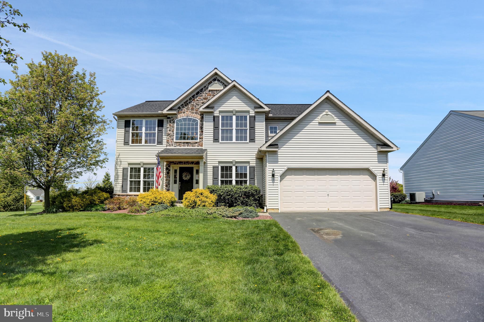 This Arbor Greene beauty truly has an open floor plan with barn doors throughout! Enjoy over 2600 sq ft of living space with 4 bedrooms and 2.5 baths. Enter into the 2-story foyer with the dining room and living room on either side. Continue through to a den and the family room that boasts a cathedral ceiling and opens to the eat-in kitchen with a huge breakfast bar/island. Enjoy the natural light with lots of windows in the sunroom for your morning coffee. The owner's suite has it all from a cathedral ceiling, walk-in closet and spacious full bath which includes a walk-in rain shower. Convenient main level laundry room with sink, countertop and storage cabinets. The lower level has been finished for additional living space to spread out. Entertain on your private rear paver patio with a pergola and common area to the side.