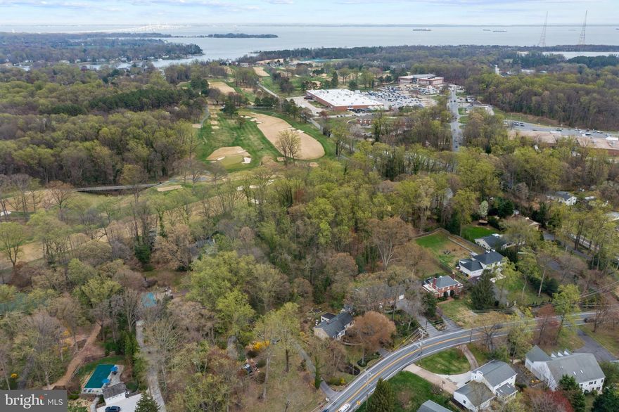 This charming ranch-style home is located in the peaceful neighborhood of East Pendennis Mount of North Severnside.  The large lot backs up to the Naval Academy Golf Course, the property provides a serene and private setting, with the 14th hole just beyond your backyard. While the home itself is ready for updates, it presents a perfect canvas for renovation, or even complete reimagining.
This location is ideal for those who love nature and convenience. You’re just minutes from Greenbury Point Nature Park and its scenic trails, as well as downtown Annapolis, the U.S. Naval Academy, and West Annapolis.
Bring your vision and ideas to this property and make it your own.