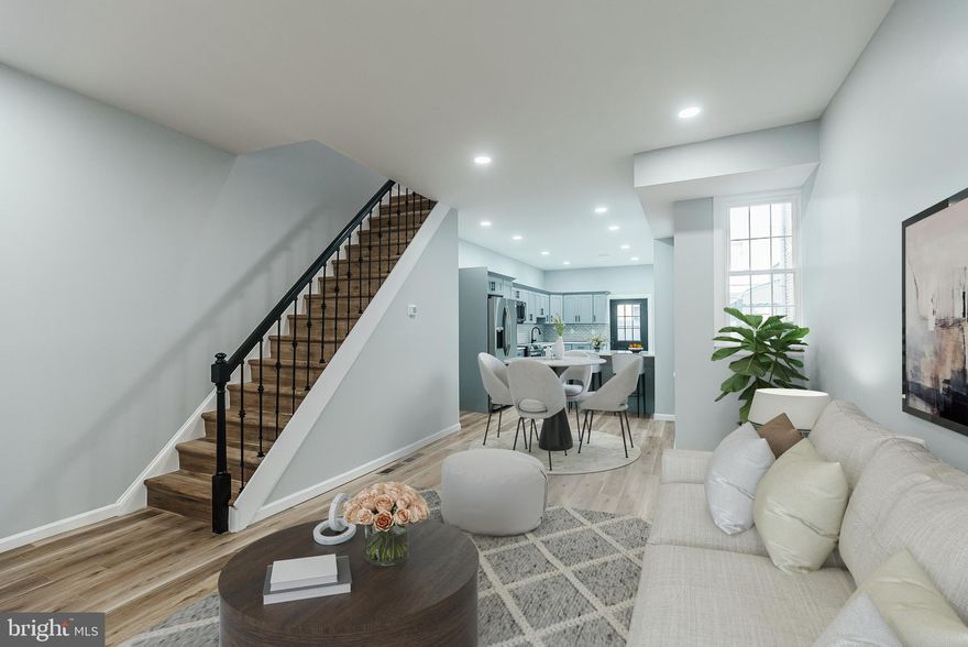 Welcome to this beautifully renovated 3-bedroom, 2-bath home offering modern finishes, open-concept living, and a private outdoor space. Step inside to find wide-plank flooring, recessed lighting, and a bright, airy layout perfect for entertaining. The main level features a spacious living and dining area flowing into a brand-new kitchen with shaker cabinets, quartz countertops, stainless steel appliances, subway tile backsplash, and a large breakfast bar. A rear door leads directly to your private fenced patio—ideal for grilling, relaxing, or hosting. Upstairs offers generously sized bedrooms with ample closet space and a stylish full bathroom. The finished basement provides additional living space perfect for a media room, home office, gym, or guest suite, complete with a full modern bathroom and laundry area at 2nd floor. Additional highlights include: Central air & forced air heat, New electrical, plumbing, and mechanicals, Modern black hardware and fixtures, Energy-efficient windows, Fresh exterior brick façade. Some photos are virtually staged.