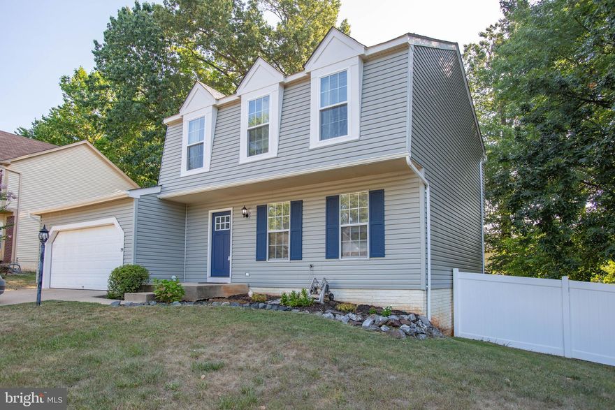 Wonderful home ready for new owners.  Nicely updated with a new kitchen 2019, ceramic back splash, quartz counters, stainless appliances,  wonderful deep sink, white cabinets.  The home has new siding, new roof, and a new vinyl privacy fence.  Very friendly back yard with deck and patio leading to the family room, and the walkout basement.  Hardwood floors throughout the main level.  Fresh paint, new lighting, and hardware.  New Hot Water tank in 2019. Convenient concrete driveway for 2-4 cars and a 2 car garage. new tile surrounds in the upstairs baths.