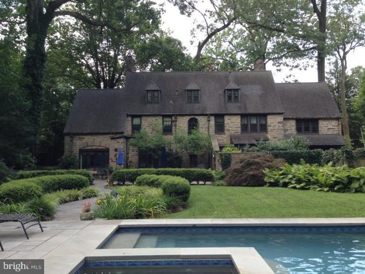 Classic all stone Norman style renovated house on one of North side Haverford's premier streets. Exquisite old world architectural details throughout with wonderful l moldings, wainscoting, built-ins, etc. There is updated eat-in kitchen with stainless steel appliances, granite counter tops and island. The rooms for living and entertaining are gracious and large. Exquisite sun room with wonderful views. Upstairs is a fabulous master suite with marble bath, dressing room and office/den with built-ins. The third floor boasts two additional bedrooms, a full bath, and significant storage. The outside is magnificent with huge slate patio, stone walls, pool and sophisticated landscaping. Easy walk to MCC, train and shopping. Sellers hold PA Real Estate licenses