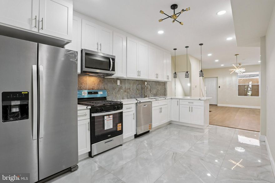 Welcome to this fully renovated, move-in ready 3-bedroom home in the heart of Kingsessing! Boasting modern, high-end finishes throughout, this beautifully updated property offers spacious bedrooms, a fully equipped kitchen, and a private rear yard perfect for relaxing or entertaining. The finished basement features a full bath and a versatile bonus room—ideal for a guest suite, home office, or gym. With stylish updates and thoughtful details from top to bottom, this home is a must-see! Mortgage savings may be available for buyers of this listing.