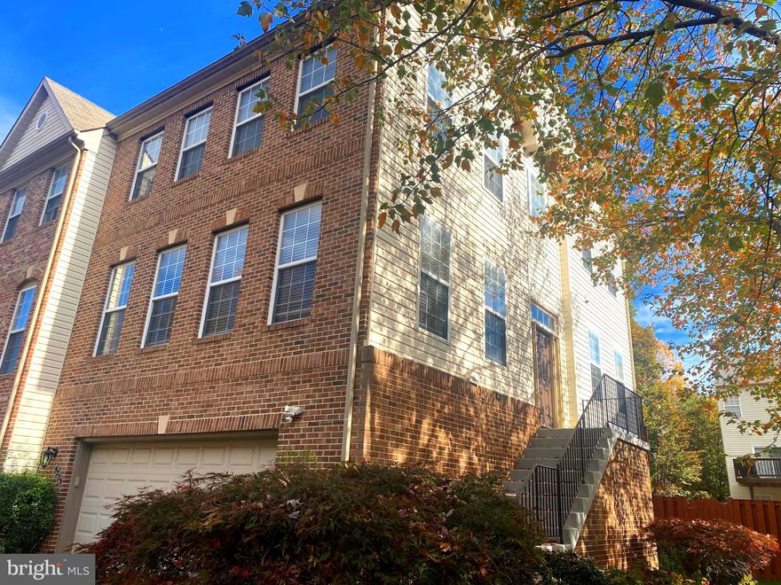 Great Location, Well maintained, Upgrade End unit Townhome. 2 Car Garage, Large Deck and Patio, Hardwood Floors, Fully Fenced Back Yard, Upgrade Kitchen with SS Appliances, Thermador Stove, Quartz Counter Top, Upgrade Bathrooms.  Walk out basement has full bathroom, Cozy Fire place.