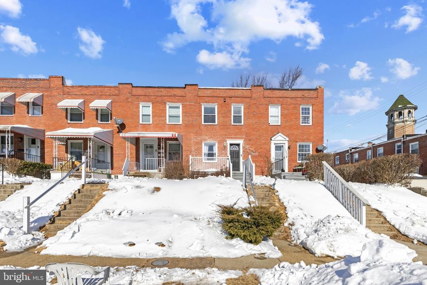 Nestled in the heart of Medfield, this comprehensively updated 3-bedroom, 2-bath townhome is a turn-key gem. Meticulously maintained, the main level features an open floor plan with gleaming hardwoods and a chef-inspired kitchen anchored by crisp white cabinetry and an oversized social island. Upstairs, you will find three intimate and cozy bedrooms, each offering a peaceful retreat. For versatile living, the fully finished walk-out basement provides an ideal space for entertainment. Step outside to your private oasis: a rear deck overlooking an expansive backyard recently enhanced with fresh sod and a brand-new privacy fence. For added convenience, this generous outdoor space offers the potential for easy conversion into a private parking pad. Best of all, you are just a pleasant 15-minute stroll from the vibrant shops and renowned dining of Hampdens famous "Avenue".