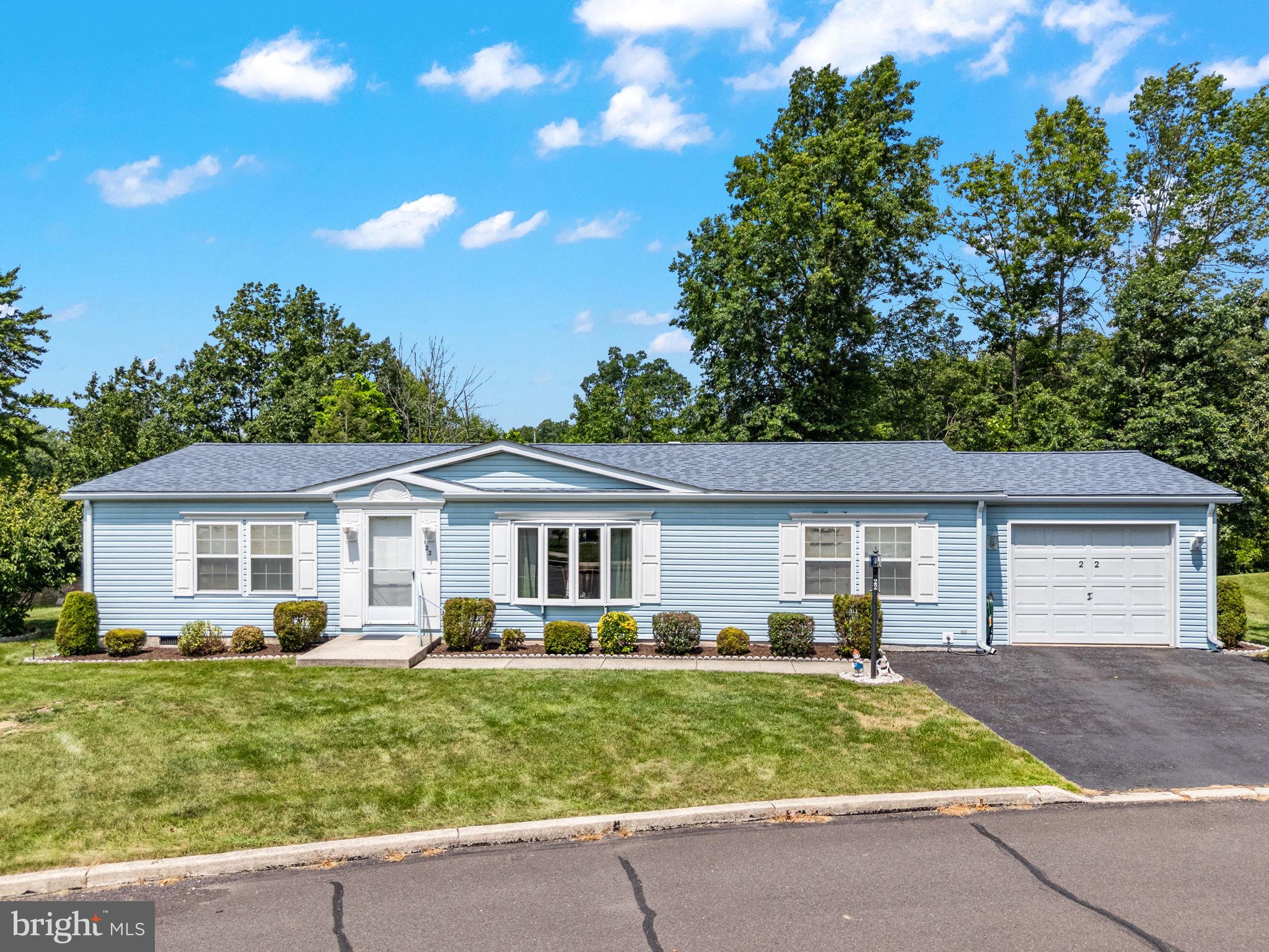 Welcome to Quiet Acres, a beautifully maintained 55+ community offering peaceful surroundings and a strong sense of community. This lovingly cared for 3-bedroom, 2-bath home features an inviting open-concept living and dining area, perfect for entertaining or relaxing in comfort. Just off the dining space, you'll find a charming sunroom that overlooks open green space—an ideal spot for enjoying your morning coffee or unwinding at the end of the day.
The primary suite offers a private full bath, while two additional bedrooms provide ample space for guests, hobbies, or a home office. A one-car garage adds convenience and extra storage. Park guidelines allow dogs 30 lbs and under, making it a great fit for pet lovers seeking a low-maintenance lifestyle.
If you're looking for peaceful living in a well-kept community, this home is a must-see!