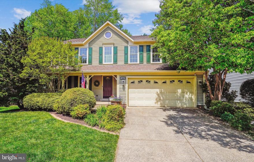 Classic colonial charm and crisp elegant upgrades throughout in the BEST Wellington LOCATION! Walk to the POOL and POND and less than two miles from the VRE commuter train and the charm of Old Town Manassas. THIS IS THE ONE! This location is designed for connection, fun, and relaxation—grab your towel and stroll over for a swim!
The lush front lawn, blooming landscaping, and a classic front porch—complete with a charming swing welcomes you home. Inside, the two-story foyer sets a grand tone, leading into the elegant front living room featuring built-in shelving and the first of two fireplaces. This space flows into the formal dining room with views of the backyard and side garden.
The fully refinished kitchen has a high end feel with quartz countertops, custom tile backsplash, new stainless-steel appliances, and an island. The Morning room bathes the kitchen in natural light. The adjacent family room offers a second fireplace with a crisp white mantel flanked by floor to ceiling windows next to another wall of floor to ceiling windows, creating an inviting atmosphere for sunny afternoons or for cozy evenings.
Upstairs, the primary suite is a true retreat with soaring cathedral ceilings and a luxury bath featuring a soaking tub, custom walk-in shower, dual vanity, walk-in closet, and separate water closet. The laundry is upstairs tucked away in a hall closet. Three additional freshly painted bedrooms and a well-appointed hall bath complete the upper level.
The finished lower level offers incredible flexibility with a designer full bath featuring luxury wallpaper a jetted tub and slate tile, a spacious rec room ideal for game nights with a built in bar area and beverage fridge...or guest space, and a convenient office nook perfect for remote work or study.
Step outside to a shaded garden oasis featuring a 400 square foot brick patio, split rail fencing, and a tool shed—the perfect backdrop for outdoor entertaining or peaceful mornings with coffee. The neighbors on this block also enjoy the proximity to the bus stop on the street, no need to sit in the car rider lines! 
Don't miss this rare opportunity to own a home that blends classic elegance, modern comforts, and an unbeatable community lifestyle. Special financing is available through Project My Home offering LENDER PAID 1% interest rate reduction for the first full year...or take the cash value and apply to your closing costs! Home is currently enrolled in a premium home warranty with the option to transfer to buyer at closing.