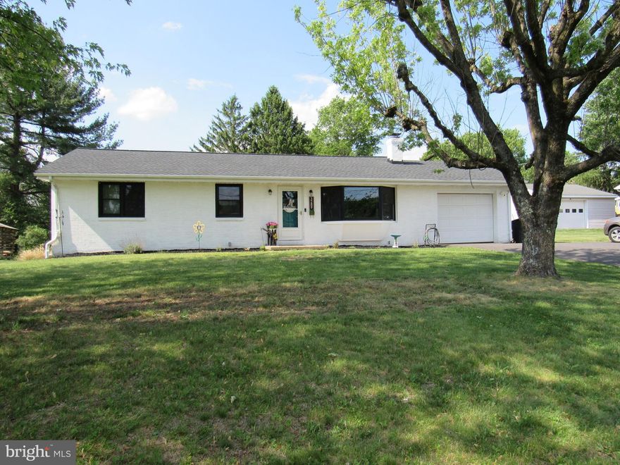 Welcome home to this beautifully updated rancher, where nearly every major feature has been upgraded within the last three years — including the roof, windows, generator, water softener, sliding glass door, and dishwasher. The home features a spacious kitchen with counter-height seating, a dining room perfect for entertaining, and a large living room highlighted by a cozy fireplace and a beautiful bay window overlooking the front yard. Three bedrooms offer hardwood floors throughout, adding warmth and timeless character. Step outside to enjoy the peaceful backyard, ideal for relaxing summer evenings. Additional features include a one-car garage and a separate storage garage, providing plenty of extra space. Packed with smart home features and conveniently located on a tranquil road close to major roadways and shopping, this home offers the perfect blend of comfort, convenience, and modern living. Upgrades - Smart thermostat / app lighting out front / Smart garage door.   Generator and dryer run on propane