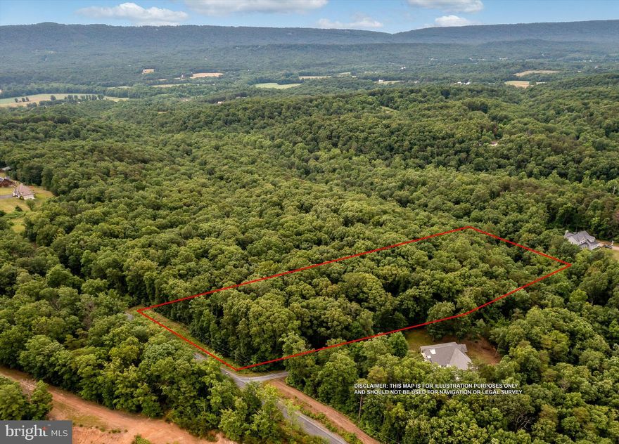 Building Lot- looking for a place to build your new home-STOP- you may have just found it. Don't miss out on this wooded 5.51 acre lot. This lot is in a small subdivision with wildlife and surrounded by mountains. Electric runs across the front of property so well & septic is all that you need to enjoy the peaceful country living. This wooded lot is located perfect for a full-time or part time home. If peace and quiet is what you want, this may be your last stop. Don't hesitate, this one will go fast. Perc. on file.