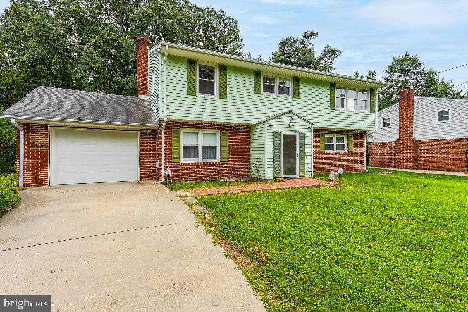 Welcome to this charming and bright home, a great opportunity to buy a house at a TH price with NO HOA dues.
This move-in-ready home features three bedrooms and two full bathrooms. You'll find hardwood floors in the living room and bedrooms, and an updated kitchen with granite countertops. The main level offers a spacious recreation room with a fireplace and wet bar, leading out to a bright sunroom.
The open, flat yard is fully fenced, and the oversized deck and patio provide the perfect setting for quiet summer nights and outdoor entertaining. This home is priced to sell.
