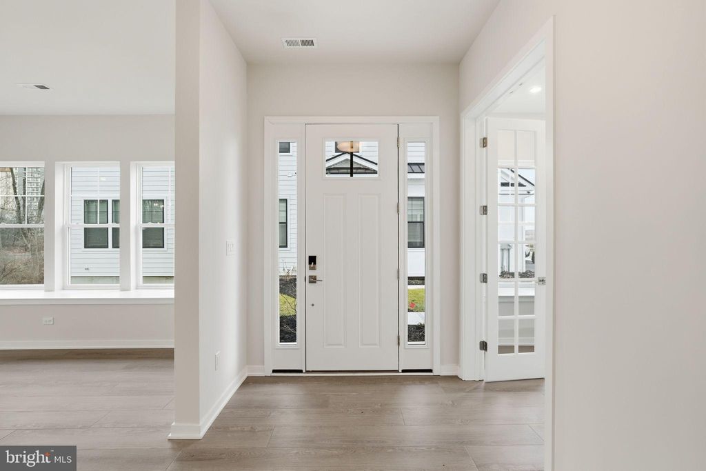 Photo of 121 River Trail Circle Ct #11, KING OF PRUSSIA, PA 19406 (MLS # PAMC2166050)