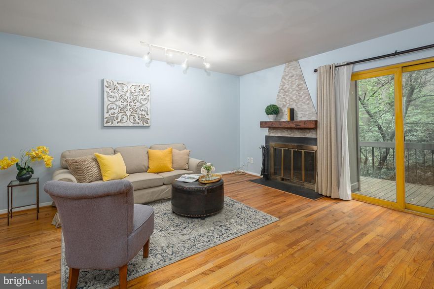 Well-appointed townhome in a quiet community is now waiting for its new owner. First floor is cozy and inviting, with a separate dining room, updated kitchen with granite counters, modern backsplash, stainless appliances, and an open living room featuring a fireplace with a custom mantel and a walk out to your own private deck overlooking the woods and the pool. Second floor offers three spacious bedrooms, including a master bedroom with its own bathroom, walk-in closet, as well as two secondary bedrooms with a hall bathroom. Lower finished level is perfect for entertainment, work from home, or a 4th bedroom with its own private bathroom. The house is minutes from the community pool, tennis courts and playground.