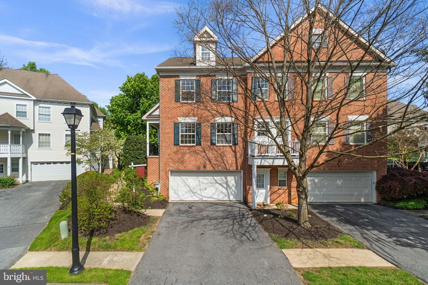 Fabulous 3 bedroom, 2 full and 2 half bath plus 2 car garage EOG townhome on cul-de-sac in gated community near Main St. in historic Reisterstown. Engineered hardwood and chair rail in open living / dining area and eat-in kitchen.  Spacious kitchen has white cabinetry, S.S. appliances, gas stove, backsplash and island with access to raised deck. Half bathroom also in main level. Upper level has LVP flooring, 3 bedrooms and laundry area. Primary bedroom has spa bath and walk-in closet with organizers plus 2 additional bedrooms and full bath off hallway. Family room on lower level has LVP flooring, gas fireplace, half bath plus access to paved brick patio and 2 car garage. Must see this gem!!!
