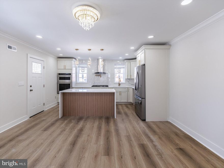 Welcome to 6343 Milton Street, a beautifully updated corner property offering a rare combination of thoughtful renovation, generous lot size, and an established residential setting. Fully renovated by a licensed contractor, this home showcases extensive upgrades throughout, delivering a refreshed and modern interior designed for today’s lifestyle.

Situated on a larger lot than many surrounding properties, this corner location provides enhanced curb appeal, additional outdoor space, and a sense of openness that is hard to find.

Inside, the home features custom finishes throughout, highlighted by a stunning white quartz modern countertop with a waterfall-edge design that creates a sleek, high-end focal point in the kitchen. The space is equipped with a gas cooktop, electric oven, built-in wall microwave, and an electric fireplace that adds both warmth and contemporary character to the living area. The renovation reflects careful planning and attention to detail, with cohesive finishes, updated systems, and a clean, sophisticated aesthetic throughout.

The property is located in a well-established neighborhood known for its residential character and convenient access to nearby amenities. Residents enjoy proximity to local shopping, dining, parks, public transportation, and major roadways, making daily commuting and errands efficient while still offering a true neighborhood feel.

This home presents an excellent opportunity to own a fully renovated corner property with added lot value in a desirable Philadelphia location. Schedule your showing and experience the craftsmanship and custom upgrades firsthand.