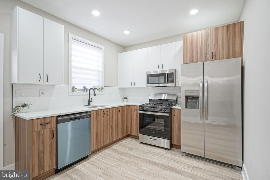 Welcome to 1933 McClellan St, a recently updated 2-bedroom, 1-bathroom home in the heart of South Philadelphia. With modern touches and a fresh look, this home presents a fantastic opportunity for first-time buyers or investors seeking a rental-ready property. Step inside to a bright and airy living space, enhanced by large south-facing front windows, new flooring, and recessed lighting. The adjoining modern kitchen features soft-close two-tone cabinetry, a stylish subway tile backsplash, and stainless steel appliances, including a dishwasher and microwave. Upstairs, you’ll find two well-sized bedrooms, a full bathroom with a tiled shower, and a convenient upper-level laundry closet. The unfinished basement offers valuable storage space and houses the updated water heater and HVAC system. Outside, enjoy a cozy backyard, perfect for a small garden or a peaceful morning coffee spot. Located just a short walk from the acclaimed shops, restaurants, and cafés of Passyunk Avenue, the historic Italian Market, and other vibrant cultural attractions, this home puts the best of South Philly at your doorstep. With easy access to public transportation, 1933 McClellan offers convenient city living at an attainable price.