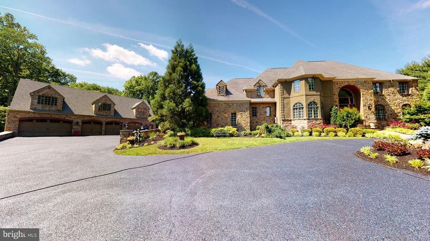 Welcome to this magnificent Brandywine Valley Estate, that is truly one of a kind customer built home! Designed with 6,800 square ft. of top -notch  quality that boasts 6 bedrooms and 4 full baths and 2 half baths in the main house. As you drive up the circular driveway to the home you will instantly see that it is surrounded by over 3 acres of beautiful landscaped grounds. Step inside the home into a stunning 2 story grand foyer with marble flooring and curved stairway. To the left is an elegant dining room with beautiful hardwood flooring and custom wood trim that provides the perfect setting for large family dining. As you pass through the butlers station, there is a gourmet eat in kitchen, featuring 42in.cabinetry, granite countertops and a 6 burner range-top island with seating. This kitchen also has a GE double oven and a built in refrigerator. The open floor plan seamlessly flows into the great room with exquisite craftsmanship of millwork and wood trim, cherry hardwood floors and perfectly detailed gas fireplace with surround marble. Next, enter into the first floor in-law/au pair suite with a spa like full bath, custom shower, dual granite vanities and travertine flooring. This room also has access to the backyard terrace through the French doors. Just off the kitchen is a beautiful, bright sunroom surrounded by windows that overlook an amazing view of a breathtaking paradise. On the second floor is the ultimate owners bedroom suite with vaulted ceilings and stunning custom millwork, rosewood flooring centered with a floor to ceiling gas fireplace with surround marble. Added bonus is a balcony over looking the spectacular private backyard. Walk in his and hers  California closets and a lavish owners suite bathroom with custom design vanity with dual onyx sinks. The shower consists of 15 shower heads to provide the luxurious experience enclosed in glass and onyx flooring. Soak in the air driven extra large tub that faces a hidden tv behind the mirror. The owner's bathroom also features heated floors! After a nice, relaxing bath, you can enter into the theater room with projector and movie screen custom cabinetry, mini fridge and sink. Completing the 2nd floor are 3  additional bedrooms and 2 full bathrooms. Now to be wowed by the backyard, start off on the oversized patio with a built in BBQ area, following the pathway down into the in- ground concrete pool surrounded by lush gardens. Guest will enjoy the private stone pool house as it offers a full eat in kitchen, 2 bedrooms each with there own full bath. Another feature of this beautiful home is a car collectors dream a detached 10 car(2 deep) garage with a full attic, full basement and a half bath. This home also offers speakers inside and outside for entertaining guests or for your own pleasure. This is luxury living at its finest!! The home also features a home security system in the main house, pool house and garage. There are 3 pin pad locations in the main house. There was a BRAND NEW ROOF installed in August.