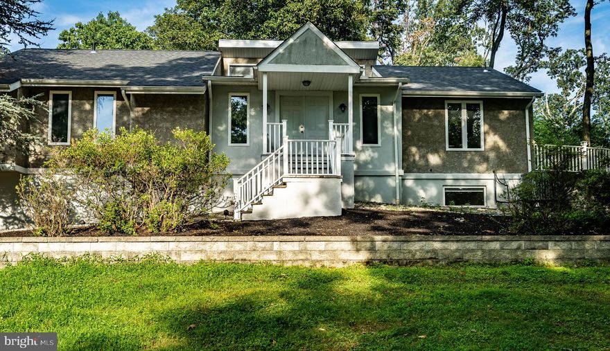 Nestled on a serene 1.5-acre lot, this charming detached contemporary  home seamlessly blends contemporary design with the warmth of a raised ranch. Built in 1979. Gutted and redone in 2004-2025, this residence boasts a timeless appeal. 2,271 square feet of thoughtfully designed living space, this home offers four spacious bedrooms and two full bathrooms, ensuring comfort for everyone. Step inside to discover a stunning  living room with vaulted ceilings, highlighted by a two story fireplace, perfect for gathering with loved ones on chilly evenings.  An additional great room with vaulted ceilings was added.   The fully finished basement, complete with garage access and a workshop, provides endless possibilities—whether you envision a recreational space, a home office, or a creative studio. The attached oversized garage accommodates two vehicles, while the expansive driveway offers ample parking for guests. Enjoy the convenience of interior access from the garage, making daily routines a breeze. Outside, the generous lot provides a private oasis for outdoor activities over looking a small pond, gardening, or simply unwinding in nature. The peaceful surroundings create a perfect backdrop for creating lasting memories. This home is not just a place to live; it’s a sanctuary where comfort meets functionality. Experience the perfect blend of space, style, and serenity—your dream home awaits!