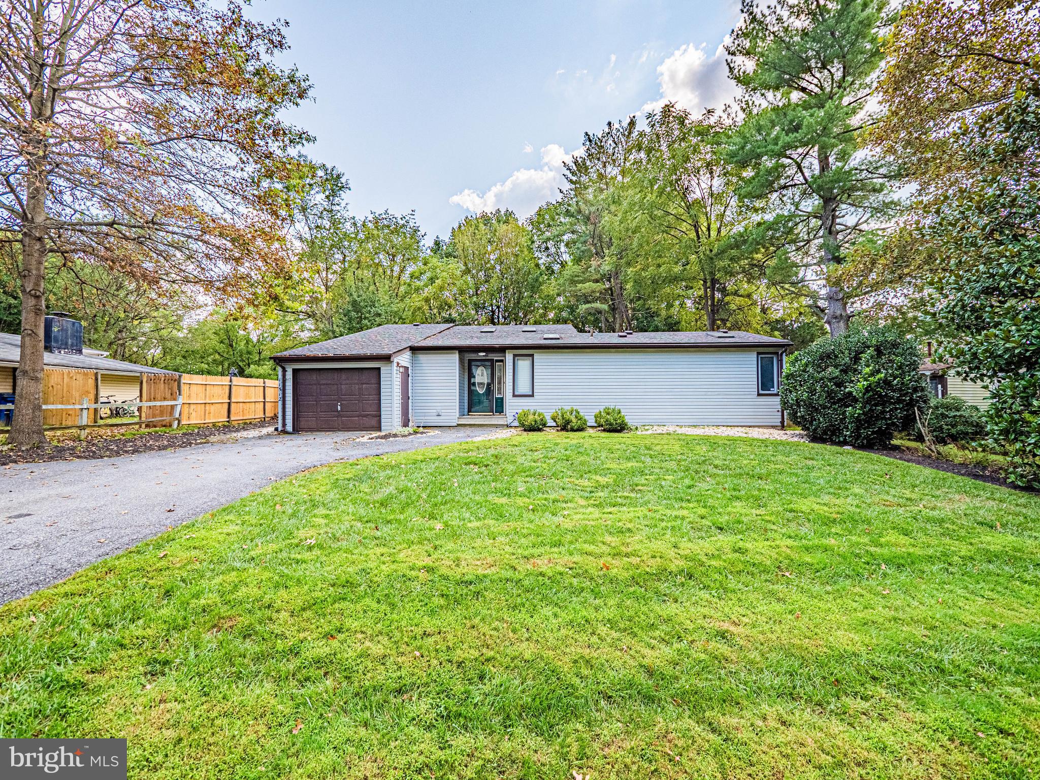 Back on the Market!!! Welcome to this primely located, wonderful 3 bed, 2 bath home in North Potomac. This home has been updated with painting and a redesigned kitchen featuring Kraft Maid cabinets, stainless steel appliances and a quartz countertop. The upright pantry and island in the kitchen are furniture pieces and will not convey, nor will the upright freezer to the left of the sink. This opens up possibilities for the new owner to configure those spaces to their needs and likes. There is LVP and hardwood flooring throughout and no carpet in the house. The back yard is fenced in and can be extended down to the bottom of the property line, enclosing a huge back yard overlooking Maryland National Capital Park Land. There is a spacious living room, dedicated dining room, den area, part of which can also be converted into a 4th bedroom. The light-filled home has vaulted ceilings and sky lights. The owner's suite features 2 closets, a dressing room, en-suite bathroom . The roof is approximately 5 years old and is an architectural single roof. The washer / dryer is newer, modern, full size and stacked. This home is adjacent to the Kentlands/Lakelands and near many restaurants, grocery stores, gyms, other conveniences, commuter routes, ICC/MD 200, I-270, Shady Grove Metro, Crown and the Rio. Welcome Home!