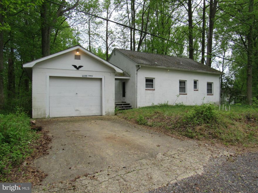Bring your toolbox & make money on this 2 bedroom 1 bath cottage in Holiday Beach. Fix this up & have your own beach cottage w/access to Chesapeake Bay or use an rental property. Home has detached garage, no heat in bedrooms, Expansive lower level w/workshop. The possibilities are endless. It offers two fireplaces one with wood stove.SOLD AS IS WHERE IS