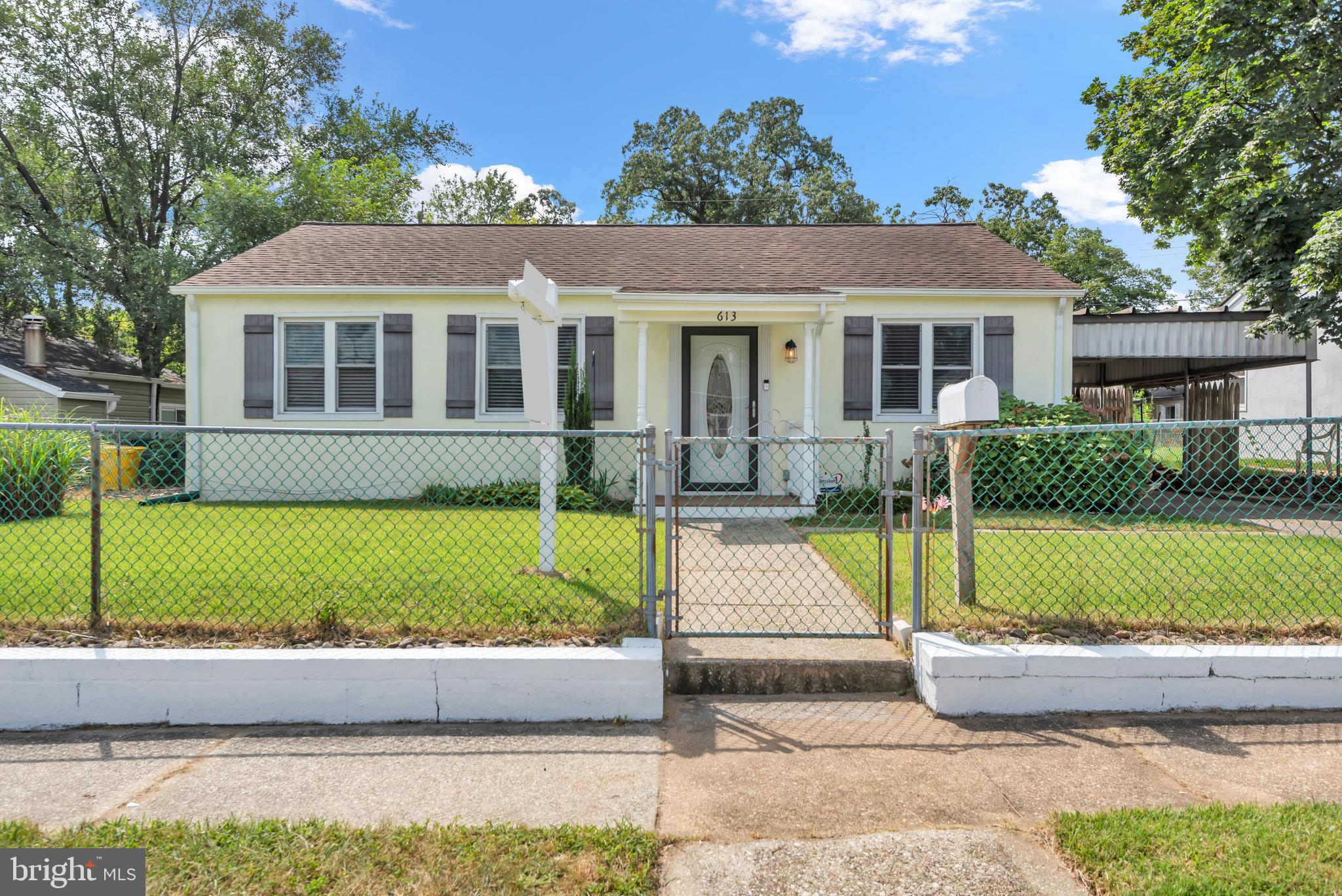 Searching for one-level living with charm and comfort? Look no further! This lovely, move-in ready home has been freshly painted throughout the home, has a new hot water heater just installed and an efficient front load washer and dryer. This home offers convenience, comfort, and style. You’ll love the fully fenced front yard, off-street parking, and the inviting enclosed sunroom—perfect for year-round enjoyment with an abundance of natural light and a cozy wood stove for those chilly evenings.
Step outside to a beautiful back yard with a finished patio, ideal for weekend BBQs and outdoor entertaining. Don’t miss out—schedule your private showing today!