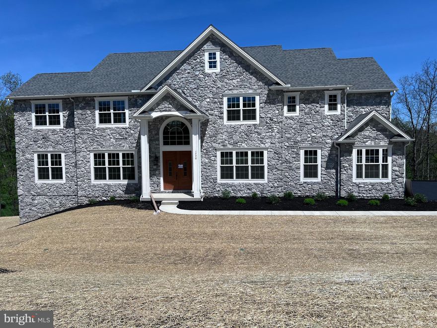 Welcome to this stunning brand-new construction home set on a spacious 1.09 -acre
lot, offering the perfect blend of luxury, comfort, and modern design. Featuring elegant
stone exterior detailing and a three-car side-entry garage, this home makes an
unforgettable first impression.
Step through grand double doors into a breathtaking two-story foyer, flanked by a formal
dining room and living room—ideal for entertaining. The foyer opens into an expansive
two-story family room, filled with natural light and seamlessly connected to a gourmet
kitchen.
The heart of the home is the open-concept kitchen, complete with a large center island,
ample cabinetry, and direct access to a bright and inviting sunroom. A convenient
pocket office offers a quiet space for work or study, while hardwood floors throughout
the first floor add warmth and elegance. The new owner also has the unique
opportunity to personalize the kitchen with their choice of backsplash, which will
be installed by the current owner.
The main level features a guest bedroom with a full bath, perfect for visitors or
multigenerational living.
Upstairs, enjoy a thoughtfully designed layout with a spacious loft, ideal as a second
living area or media room. Two bedrooms share a Jack-and-Jill bathroom, while a third
bedroom includes its own private en-suite bath. The luxurious primary suite offers two
walk-in closets and a beautifully designed modern owner’s bath. For added
convenience, the laundry room is located on the second floor.
Additional highlights include:
• 10-foot ceilings on the first floor and basement
• Two-zone HVAC systems for enhanced comfort on each level
• Tile showers in all bathrooms for a sleek, modern finish
• 400-amp electrical service, providing ample capacity for modern living and
future upgrades
This exceptional home combines space, style, and functionality in every detail—perfect
for both everyday living and entertaining.
