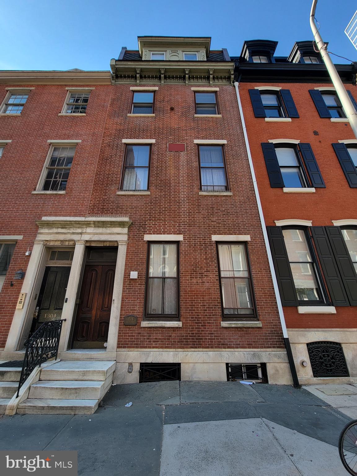 Situated in Prime Center City location of Washington Square West & featuring 2-CAR PRIVATE PARKING, street to street from Spruce St to Cypress St, this Mix Use Building features an Office & 3 Residential Apartments. Pride of Ownership is evident throughout this well-maintained building whereby the current owners have updated all the units to modern standards. This is a rare opportunity to own this Prime Center City Brownstone building to add to your rental portfolio or excellent opportunity for an owner-occupant to reside in one unit and allow the monthly rental income to off-set the mortgage. CMX-2 Zoning. The building is comprised of a first-floor front office with 1 Bathroom, (1) 3 Bedrooms & 2 Bathrooms, (1) 1 Bedroom & 1 Bathroom and (1) 4 Bedrooms & 2 Bathrooms. Located on the first-floor front is 1F which is comprised of an office with 1 Bathroom & is currently rented for $962/month. In the rear of the building, is Unit 1R which is like a modern townhome compromised of 3 bedrooms & 2 bathrooms on 3 levels plus access to the rear yard, 1 car private parking & currently rented for $2520/month. On the 2nd floor front is unit 2 F, which is a very large 1 bedroom & 1 bathroom which includes 1 car parking and currently rented for $1583/month. On the 3rd floor is Unit 3F, which is 4 – 5 bedrooms & 2 bathrooms & rent will increase to $1854/month on June 1. All residential units are equipped with modern kitchens with Refrigerators, Dishwashers & Gas Range, updated & modern bathrooms, private laundry to include washer & dryer, hardwood floors & high ceilings with excellent natural sunlight. Turn-key operation with all separate utilities for each unit. Access to the basement with mechanicals and provides additional storage. Walkers Paradise with 100 score, Transit Score of 99 and Bike Score of 89 contributing to the ease of renting. Only moments to Broad St to access Center City or South to the stadiums & PATCO @ Locust St. Just moments to restaurants, such as Vetri Cucina, Mercato, coffee shops, Nearby parks include Seger Playground & dog park, Julian Abele Park and 1705 Rodman St. Park. This location provides super easy access to Center City, Midtown Village, Ave of the Arts Theaters & entertainment.