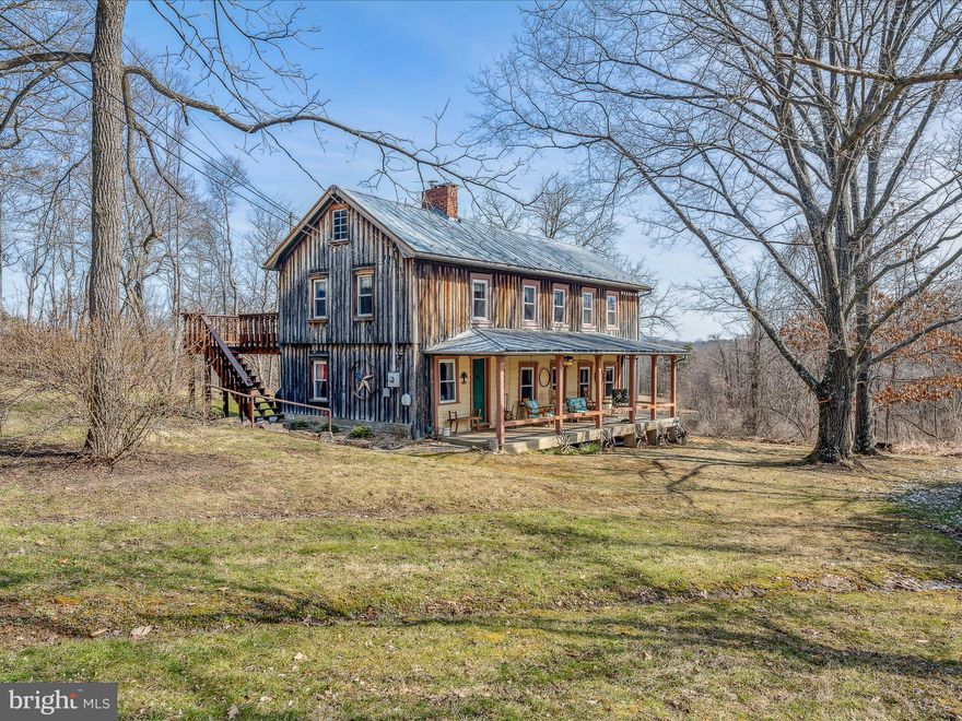 Extremely rare opportunity to own a well preserved 200+ year old farmhouse! This charming home sits on 2 beautiful acres just minutes to Historic Berkeley Springs, West Virginia. The "Old Homestead" has documentation back to 1800 when James Monroe signed the land grant. The Old Homestead comes packed with history and is fully furnished and appointed for its new owner. Full history available in MLS documents.  Call your Realtor today to schedule an appointment to see this amazing home.
