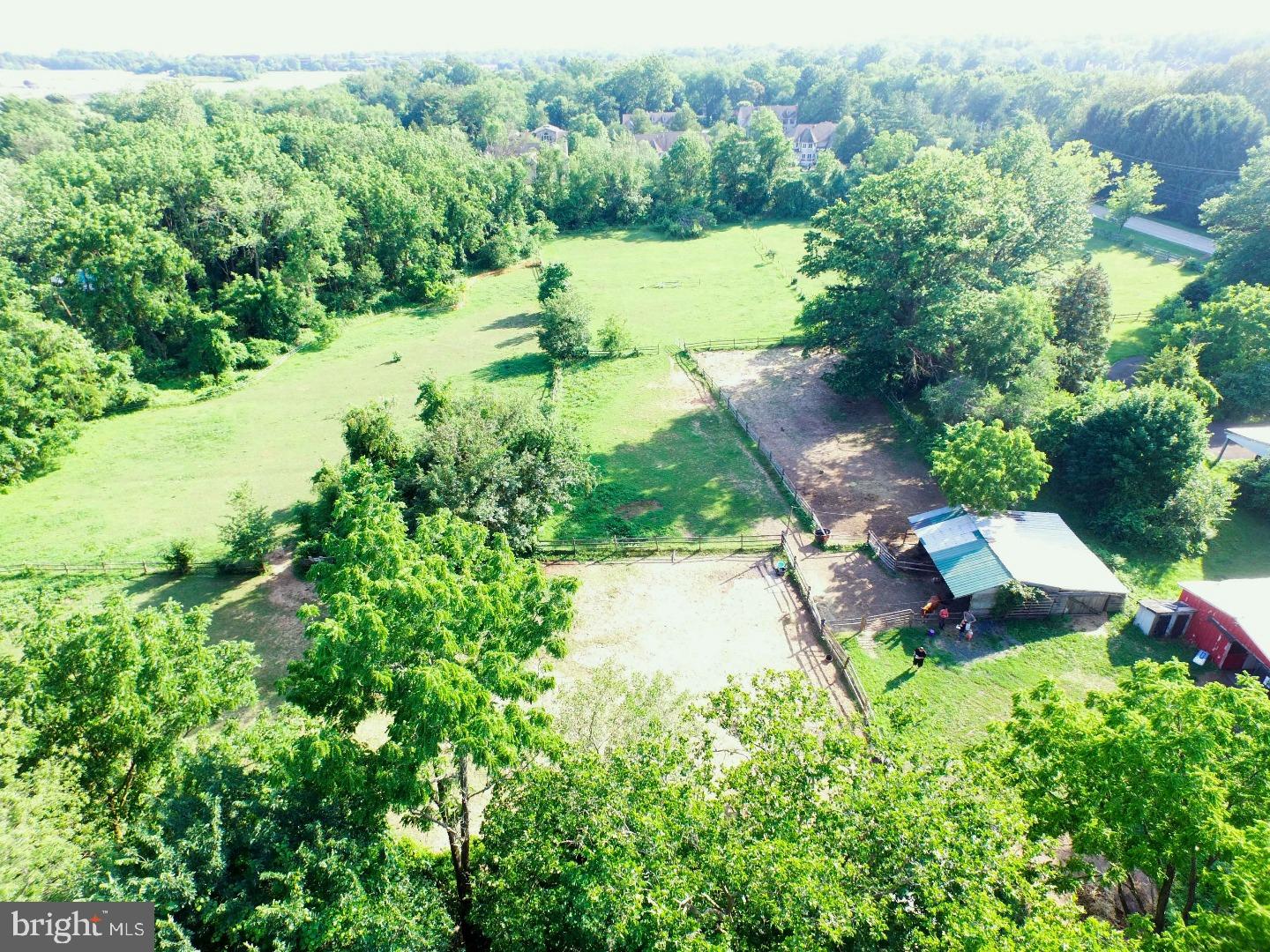 The center lot at 1218 Walton Road (Lot 2)currently houses the barn and farmhouse on this idyllic property. A former horse farm, this property offers mature trees, exceptional privacy, and an extremely generous building envelope. Public water, sewer and natural gas are all available. Use our builder or bring your own. Schedule a tour today and start planning your dream home! Removal of all structures and fencing is included in list price. Available in combination with lot 1 as a 5 acre building site. Inquire for pricing.