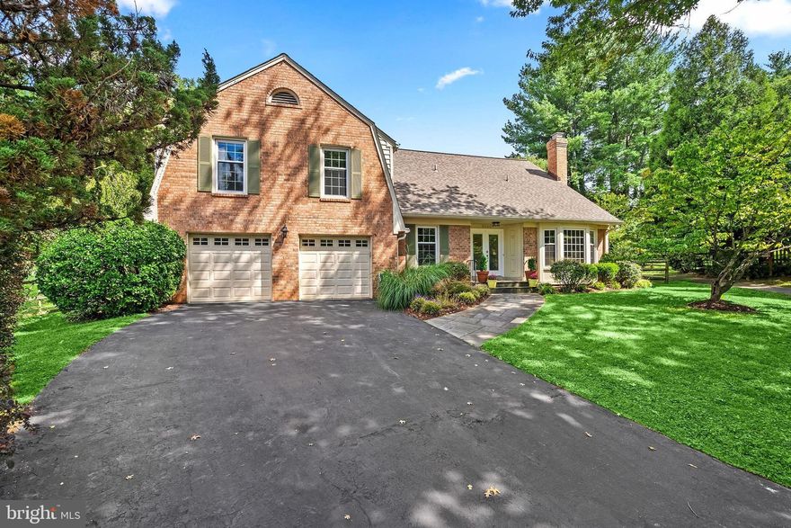 Welcome to 9000 Willow Valley Drive, an updated brick colonial on a private cul-de-sac in Potomac’s highly sought-after Copenhaver community, directly backing to Copenhaver Park and just one block from Cold Spring Elementary School within the Wootton cluster (transitioning to Churchill cluster in 2028). Set on a level, landscaped 0.31-acre lot, this 5-bedroom, 3.5-bath home offers approximately 3,708 square feet of above-grade living space, thoughtfully designed for both everyday living and entertaining. Hardwood floors run throughout the main and upper levels, enhancing the home’s warmth and continuity. The main level features formal living and dining rooms, a private home office, and a spacious family room with a gas fireplace. A wood-burning fireplace anchors the living room, adding character and warmth. The eat-in kitchen includes granite countertops, stainless steel appliances, and a large pantry, with easy access to the dining and living rooms and a pass-through window overlooking the family room. Upstairs, the primary suite offers a flexible sitting room or second home office, walk-in closets, and a renovated spa bath with heated floors, heated towel rack, jetted tub, dual vanity, and glass-enclosed shower. Four additional bedrooms and two updated full baths provide ample space, along with the convenience of upper-level laundry. The lower level includes a finished recreation room well-suited for a second family room, media space, home gym, or playroom, along with a workshop, storage, and an additional laundry area. Outdoor living is a standout feature, with a fenced backyard, flagstone patio, mature landscaping, and a large garden. A new gas grill is connected to a dedicated gas line, creating a ready-to-enjoy outdoor entertaining space. Both the kitchen and family room provide direct access to the backyard, and the property’s direct connection to Copenhaver Park offers a rare extension of usable green space. Recent improvements include renovated bathrooms, new roof, and updated windows, doors, and siding, providing move-in ready convenience and long-term value. Copenhaver residents enjoy access to a private 9-acre park featuring a pond with fountain, gazebo, footbridge, two tennis courts, basketball courts, a playground, a baseball field, walking paths, sledding hills, picnic tables, and benches. The nearby Montgomery Square Copenhaver Swim Club offers a recently renovated heated 25-meter pool, a pool with interactive water features, a swim team, a sports court, and a playground. Ideally located near Cabin John Shopping Center, Park Potomac, Potomac Woods Plaza, and Potomac Village, offering a wide variety of shopping and dining options. 1 Year Home Warranty Included.