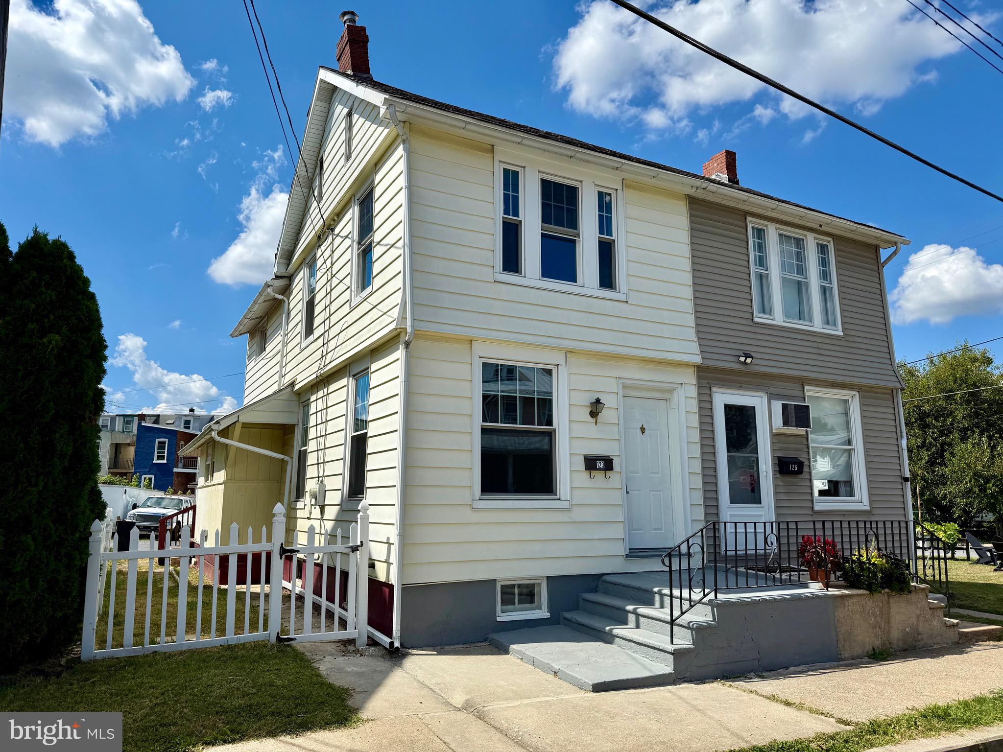 Welcome home to 123 N Walnut St - This home has been refreshed and prepared to provide its next owner with a clean slate and the ability to move right in and begin enjoying! Featuring beautifully refinished hardwood floors to provide a warm, natural look throughout, a new bright & modern kitchen with soft close doors & drawers, a dedicated coffee station, beautiful butcher block counters tops to match the hardwood floors, new sink & faucet, new bathroom vanities, toilets and mirrors, new light fixtures throughout, new door hardware and lots more. The home also includes rear parking with access via the alley way. Come check out all this home as to offer, enjoy!