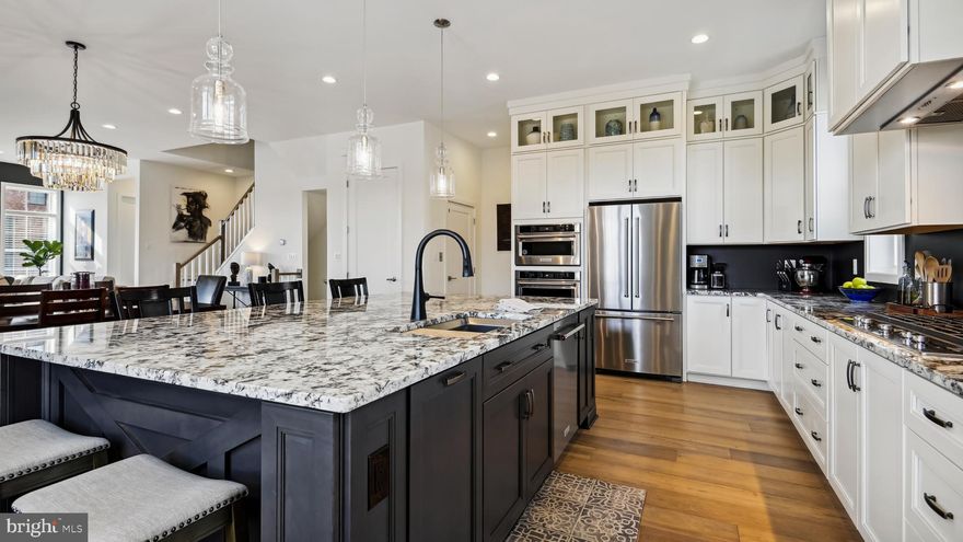 Welcome to Regency at Belmont Chase - Your Premier 55+ Community!
Experience the pinnacle of luxury living in this exceptional end-unit Dylan Virginia townhome, perfectly situated in Toll Brothers' Regency at Belmont Chase Community. With 3 bedrooms, 3.5 full baths, and an expansive 3,255 square feet of living space, this home offers a blend of comfort and elegance. 

Property Highlights include the following.....
Elevator Access: Enjoy convenient access to all 4 floors, ensuring ease of mobility for everyone.
Private Ensuite Baths: Each of the 3 bedrooms boasts its own private ensuite bath, providing unparalleled comfort.
Designer Upgrades: Over $194,000 in designer upgrades adorn this home, creating an atmosphere of opulence.
Gourmet Kitchen: The extended island and gourmet kitchen are a chef's dream, perfect for hosting gatherings.
Stylish Features: Impeccable hardwood floors, oak stairs, granite countertops in kitchen and baths, and stunning lighting fixtures.
Cozy Fireplace: Gather in the living room around the fireplace, perfect for creating a warm and inviting atmosphere.
Abundant Natural Light: Enjoy the balance of privacy and natural light with blinds throughout the home.
Spectacular Rooftop Terrace: This is 1 of 12 units with a FULL Rooftop Terrace — 820 SQ FT of outdoor living space with expansive views, which maximizes this end unit’s 270-degree views. The Rooftop Terrace is an entertainer's paradise, complete with a refrigerator, fireplace, and TV connection. 
Belmont Country Club Amenities: Exclusive access to the Belmont Country Club amenities, including pools, tennis courts, clubhouse, and fitness facilities.
Community Perks: Lawn maintenance, snow/trash removal, grilling area, and pickleball enhance your lifestyle within the Toll Brothers Regency at Belmont Chase Community.  Perfect Lock and Leave capability.
Prime Location: Minutes away from Route 7, the Greenway, Loudoun Metro Station, and Dulles Airport.
Retail and Dining: Enjoy the convenience of easy access to Belmont Chase for shopping (Whole Foods) and an array of dining options (Cooper's Hawk Winery & Restaurant, CAVA, and MORE).
This remarkable home offers the pinnacle of 55+ living, with lavish features, accessibility, and access to outstanding community amenities. Don't miss the opportunity to make this your forever home. Schedule a viewing today and discover the unparalleled lifestyle that awaits you at Regency at Belmont Chase.