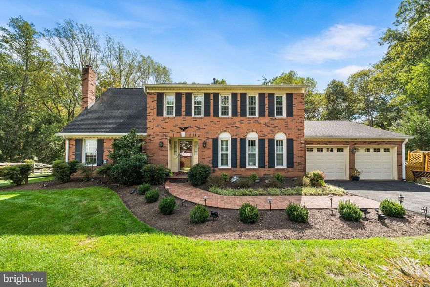 Welcome to this exceptional colonial in the highly sought-after Tamarack neighborhood, perfectly sited on a private, beautifully landscaped 0.57-acre lot—truly one of the finest settings in the community.

Freshly painted throughout, this spacious 4-bedroom, 2 full and 2 half bath home offers the perfect blend of comfort, elegance, and functionality. A welcoming foyer greets you upon entry, flanked by a main-level office with custom built-in shelving—ideal for today’s work-from-home lifestyle.

At the heart of the home, the gourmet kitchen impresses with quartz countertops, a gas cooktop, double ovens, and abundant cabinetry. Enjoy casual meals in the sunny breakfast area while taking in peaceful views of the backyard. The kitchen flows seamlessly into the inviting family room, complete with a cozy gas fireplace—perfect for everyday living and entertaining alike.

The true showstopper is the stunning four-season addition, featuring vaulted ceilings and walls of windows that showcase the serene backyard—your own private retreat in every season.

The main level also offers a formal dining room, a spacious living room, and a convenient mudroom with washer and dryer just off the garage.

Upstairs, the expansive primary suite serves as a relaxing sanctuary, featuring ample closet space, a double sink vanity, soaking tub, and walk-in shower. Three additional generously sized bedrooms complete the upper level, including one oversized room that can easily be converted into two bedrooms per the original builder’s plan—offering the potential for five bedrooms upstairs. A full hall bath with tub/shower combo completes this level.

The finished lower level is designed for entertaining, boasting brand-new carpet, a custom bar, a wood stove, a half bath and plenty of room for storage.

Ideally located just minutes from the Toll Road, the Town of Vienna, Tysons, and the Hunter Mill Swim & Racquet Club, this home also offers easy neighborhood access to the W&OD Trail—perfect for outdoor enthusiasts. All within the highly regarded Madison High School pyramid.

This is the one you’ve been waiting for—space, location, and lifestyle all in one incredible home.