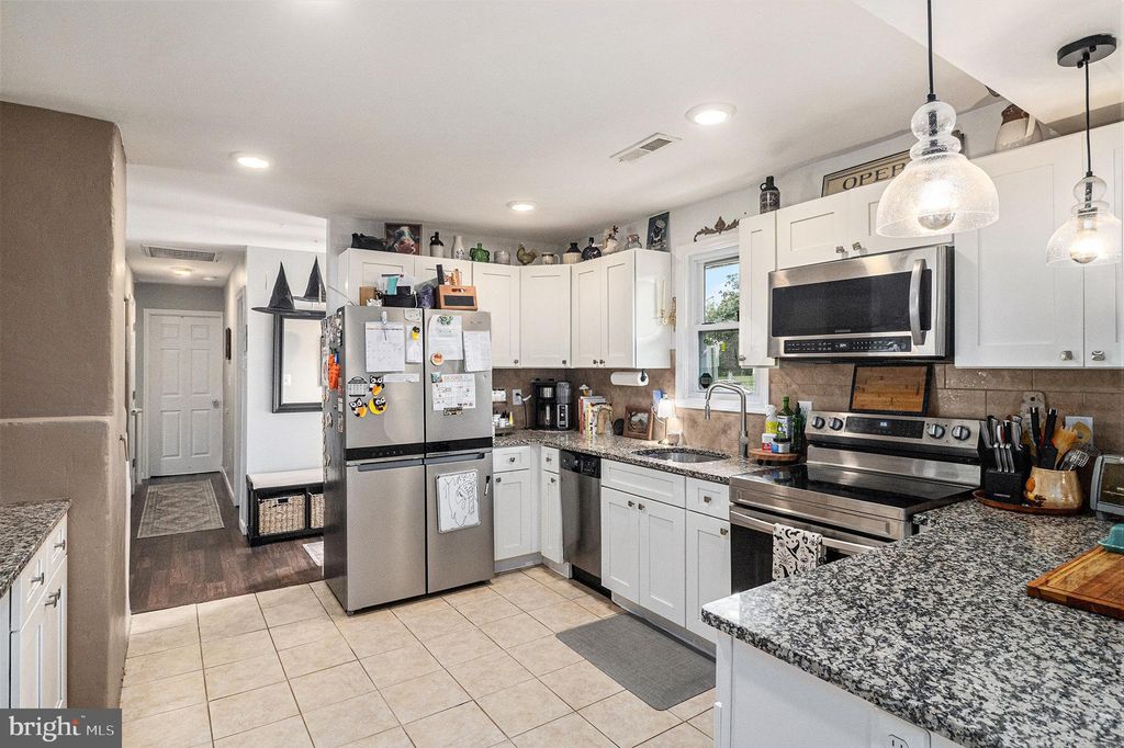 Photo of 84 Daffodil Lane, LEVITTOWN, PA 19055 (MLS # PABU2107134)