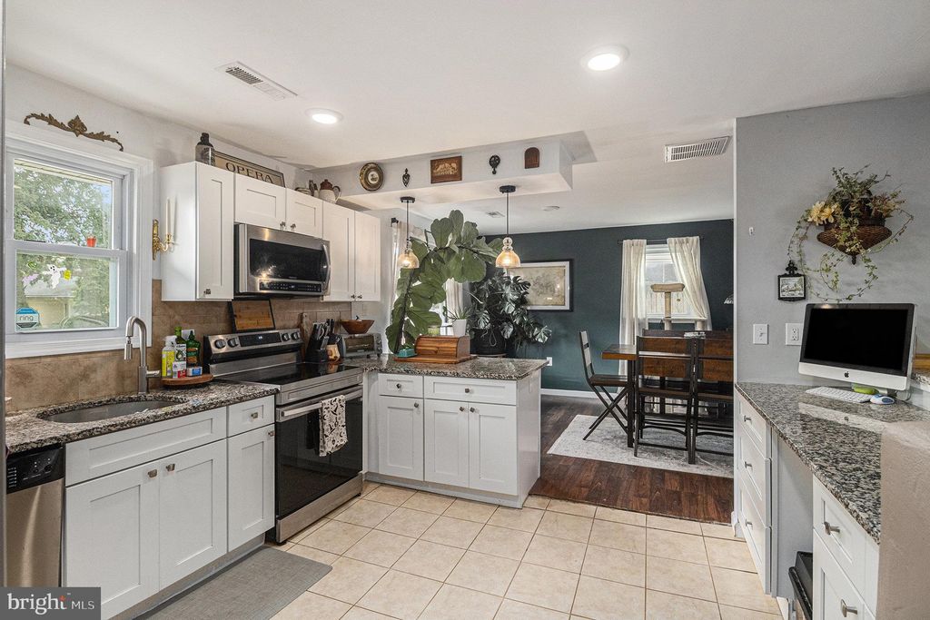 Photo of 84 Daffodil Lane, LEVITTOWN, PA 19055 (MLS # PABU2107134)