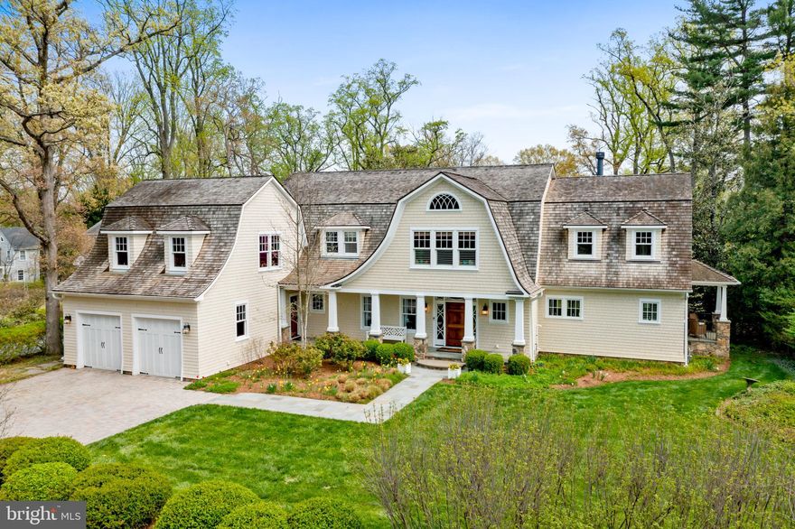 Exceptional Craftsman Home in Wardour on the Severn,  exquisitely designed, custom-built and nestled on a private, .61-acre lot.  Built in 2015, this home is a rare blend of elegance, comfort, and timeless architectural detail with over 6000 sq. feet of flexible living space. The inviting front porch  opens to the formal entryway leading to the living room with a stone-surround gas fireplace and a spacious dining room adorned with refined molding details, white oak floors, 9 ft coffered ceilings, custom arches, solid 3 panel doors.  The gourmet eat-in kitchen features a spacious island, custom cabinetry, copper and porcelain sinks, a 6-burner Wolf range, wall oven and microwave, Bosch dishwasher, JennAir fridge/freezer, walk-in pantry, skylights, and a built-in office nook. This thoughtfully designed home includes 5–6 bedrooms and 5 full bathrooms and 1 half bath. The first floor offers an office as well as a  guest suite with a full bath, while the second floor features a luxurious primary suite with two walk-in closets, a spa-like bath with soaking tub, enclosed glass shower, and elegant finishes. Additional second-floor bedrooms include a private ensuite, and a “buddy bath” with custom tile work for the bedrooms, plus an unfinished bonus room above the garage. The second floor laundry has an LG washer and dryer, ample built-in and hanging storage, and a desk for home projects. The lower-level recreation room offers the perfect retreat with a separate entrance, shiplap walls, laminate flooring, mini bar, full bath, and flexible-use room—ideal for guests, workouts, or media space. Outdoor living is equally impressive: relax on the IPE-screened porch with ceiling fan or entertain on the two-tiered bluestone patio with a built-in gas fireplace, all surrounded by professional landscaping and mature trees. Store everything you need in the oversized two car garage or the spacious mudroom with built-in lockers and closets. The paver driveway, covered front porch, and cedar shingle exterior give the home a classic coastal aesthetic. Ideally located in the highly desirable Wardour on the Severn community, this home is just steps from a scenic community path leading to one of the neighborhood’s private beaches. Walk to the charming shops and trendy restaurants of West Annapolis and enjoy the perfect blend of peaceful living and urban accessibility.