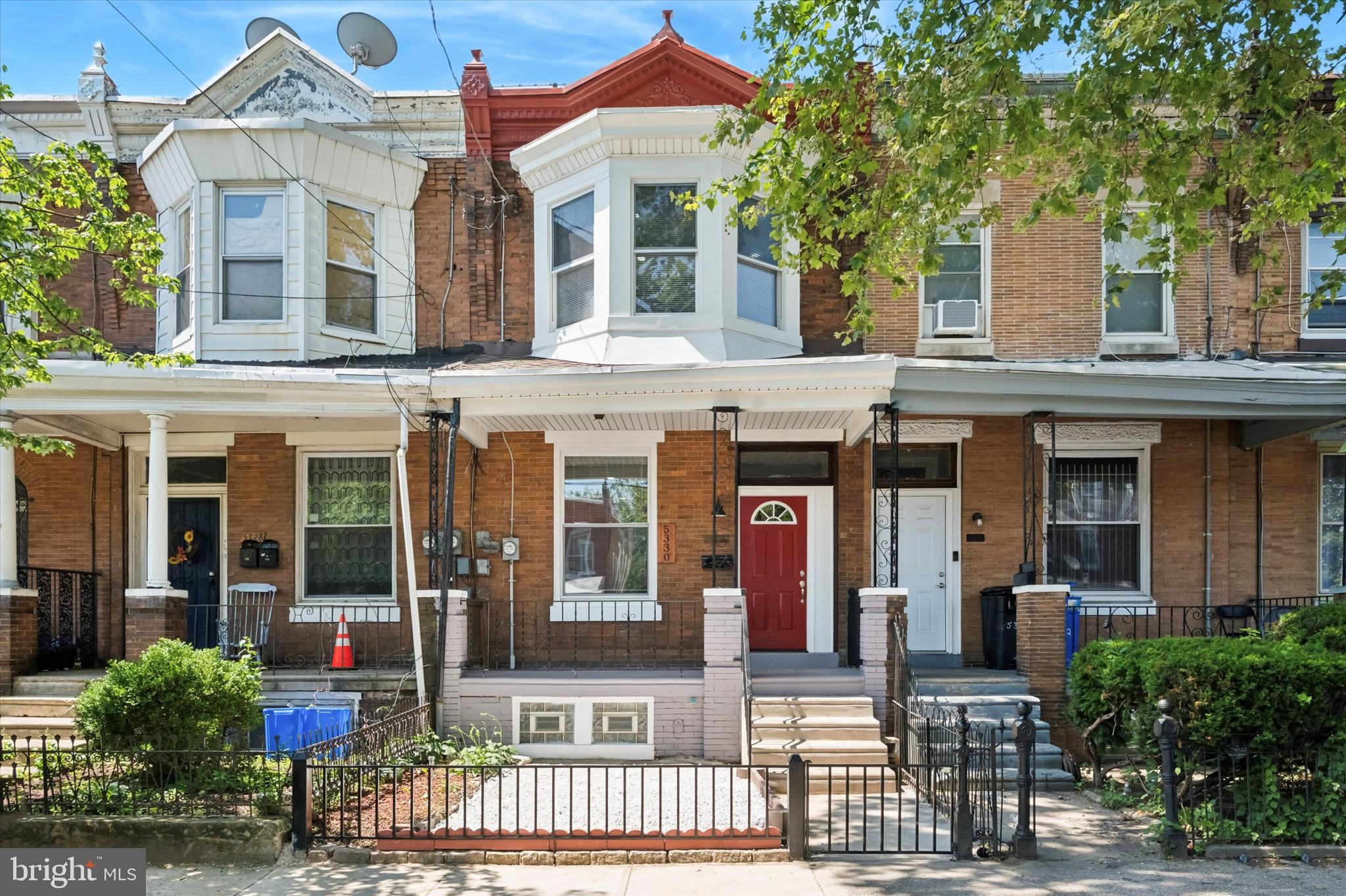 Welcome to 5330 Haverford Avenue, a truly stunning, fully rebuilt home in the heart of West Philadelphia’s Haddington neighborhood. This four-bedroom, two-bathroom property has been completely renovated down to the framing, everything is brand new, including walls, plumbing, electrical, HVAC, and finishes. The result is a home that offers the peace of mind of new construction with the classic charm of a Philadelphia rowhouse.
The first floor features an open-concept layout with high ceilings, recessed lighting, and wide-plank luxury vinyl flooring. The living room is anchored by a striking black marble decorative fireplace, and flows seamlessly into a modern kitchen equipped with quartz countertops, full quartz backsplash, sleek cabinetry, and stainless steel appliances. A spacious first floor bedroom offers flexibility for guests, a home office, or multigenerational living.
Upstairs you’ll find three additional bedrooms, including a spacious primary suite with a private en-suite bathroom. The second full bathroom is beautifully finished with tile surround and gold accents. Additional highlights include a dedicated laundry room, a clean open basement with high ceilings, and a large fenced-in backyard perfect for entertaining, gardening, or pets.
The home is located in a prime area of West Philadelphia with excellent access to public transportation. The Route 10 trolley runs along Lansdowne Avenue and provides a direct connection to 30th Street Station and Center City. Bus lines 31, 52, and 64 are within walking distance, offering easy transit throughout the city. The 52nd Street Station on the Market-Frankford Line is just a few blocks away, making it ideal for commuting to University City, Center City, or Temple University.
Nearby landmarks include Carroll Park, the Please Touch Museum, the Mann Center for the Performing Arts, Fairmount Park, and the Philadelphia Zoo. You’re also within minutes of University of Pennsylvania, Drexel University, CHOP, and Penn Presbyterian Medical Center.
This home qualifies for first-time homebuyer assistance programs and is an exceptional opportunity for both homeowners and investors in one of the city's most actively revitalizing neighborhoods. Schedule your private showing today.