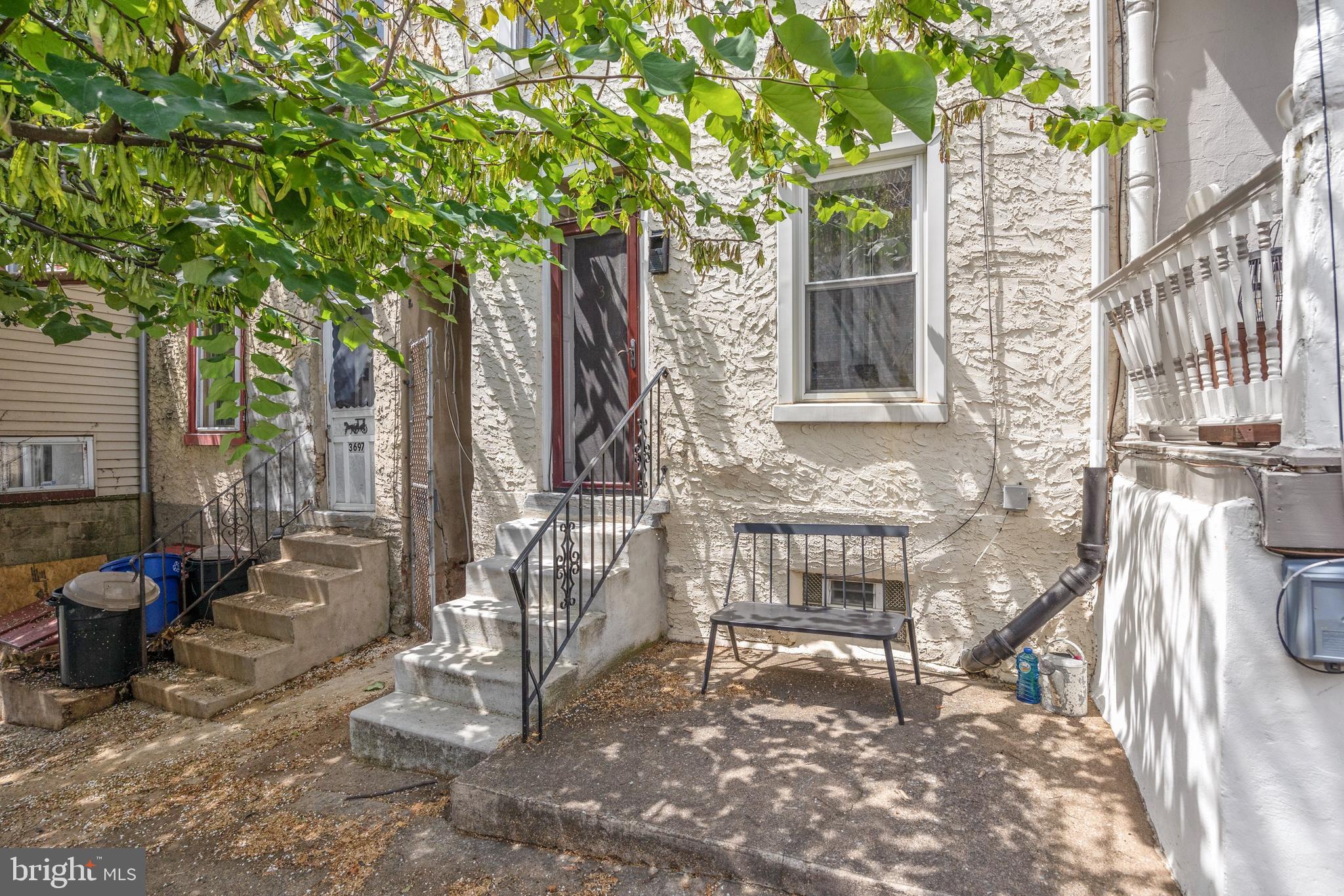 This charming three-story row home in desirable East Falls is not to be missed! Enter into a large living room filled with light. The open floor plan leads you into the dining room and kitchen, with access to the private backyard. On the second level are two bedrooms and a full bathroom. The front bedroom has two spacious closets and abundant natural light, and the bathroom includes a bathtub/shower, a full-sized cabinet sink, and a large linen closet. The third floor has two bedrooms and another full bathroom! This bathroom includes a standing shower, a full-sized cabinet sink, and extra storage. This home also features a side alley with immediate access from the street to the backyard, perfect for easy access to the rear of the home. There’s no shortage of incredible local restaurants, including The Black Squirrel Pub and Haunt, In Riva, Murphy’s Irish Saloon, Wissahickon Brewing Company, and the Thunder Mug Cafe. The home is located within walking distance of both Kelly Drive and the amazing Wissahickon Park, which offers miles of biking, hiking, and running trails. You will also be in close proximity to Center City, the East Falls train station, the I-95 and 76 highways, and a two-minute walk to Kelly Drive and Fairmount Park. This location can't be beat!