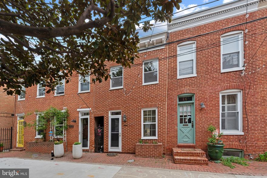 Welcome home! This charming and cozy  home sits on a quiet court in  Federal Hill's historic district. Rest assured you will feel safe and secure as this home is tucked away with no pass through traffic. Street string lights add illumination and ambiance at night! Minutes from M&T Bank Stadium & Camden Yards! With 2 bedrooms and 1 full bath, this adorable home features a large, newer deck, gas stove, hardwood floors, and newer HVAC (2016). Move right in, and start enjoying all the culture, dining and entertaining that Federal Hill has to offer!