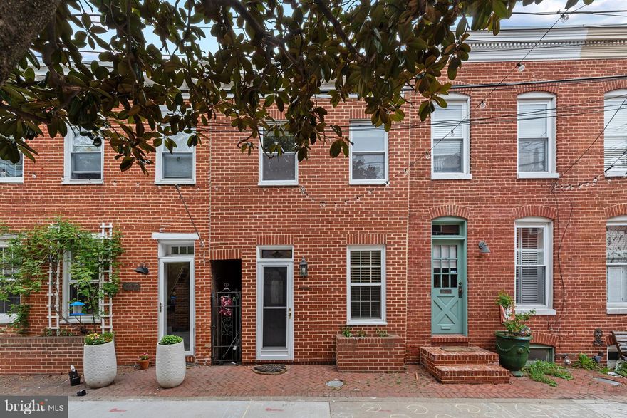 Welcome home! This charming and cozy  home sits on a quiet court in  Federal Hill's historic district. Rest assured you will feel safe and secure as this home is tucked away with no pass through traffic. Street string lights add illumination and ambiance at night! Minutes from M&T Bank Stadium & Camden Yards! With 2 bedrooms and 1 full bath, this adorable home features a large, newer deck, gas stove, hardwood floors, and newer HVAC (2016). Move right in, and start enjoying all the culture, dining and entertaining that Federal Hill has to offer!