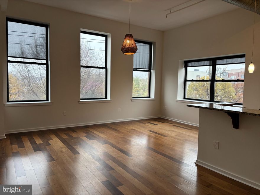 Welcome to 926 N 3rd St, Unit 3D, a stylish and sun-drenched 1-bedroom, 1.5-bath apartment located in the vibrant Northern Liberties neighborhood of Philadelphia. WITH ASSIGNED GARAGE PARKING spot!!!  This spacious third-floor unit features an open-concept layout with oversized windows, hardwood floors, and high ceilings that flood the space with natural light. The modern kitchen is equipped with stainless steel appliances, granite countertops, and ample cabinet space—perfect for cooking and entertaining. The bedroom includes a large closet and a sleek en-suite bathroom.  

Additional highlights include: In-unit washer/dryer, Central air and heat, Pet-friendly building, Secure access and elevator, Steps from restaurants, coffee shops, and Liberty Lands Park. Live just blocks from 2nd Street hotspots like Cafe La Maude, North Bowl, and The Piazza, with easy access to public transit and I-95.

Available now – schedule your showing today and make Unit 3D your next home in NoLibs!