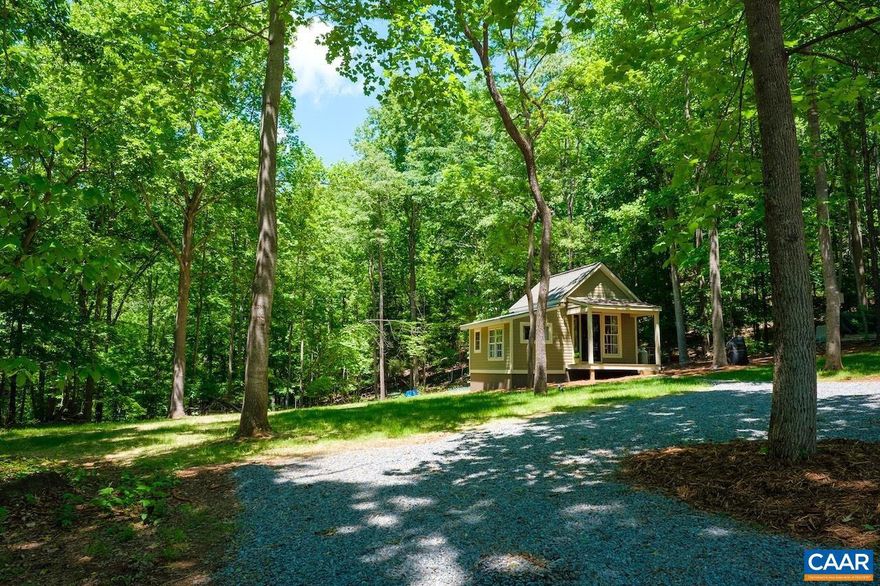 Live completely off grid in low-maintenance tiny home while building your forever dream home with mountain views and privacy! Peaceful and private to enjoy nature and not people, yet be close to area conveniences and amenities. Perfectly perched at the top of the hill with panoramic winter mountain views (could be opened with selective clearing). Cottage was built in 2020 with 416 sq ft and operates off of gas powered generators and propane for heat/tankless water heater. Features: Hardie Plank siding, double hung windows, vaulted ceiling, recessed lighting, hardwood floors, double hung windows, vaulted ceiling, full bathroom, kitchenette (dining, refrigerator, microwave, pantry), living area, sleeping loft, covered front porch, gravel drive (gated for security), flood lights, fiber optic internet access, well, 1Br septic installed, and clearing for future home with 3 Br septic permit and electric easement. No subdivision or land restrictions. Agriculturally zoned permitting animals and plenty of sunny garden space. Only 30 minutes to Charlottesville and 5 minutes to Nellysford or Afton; ideal location for Nelson 151 Wine and Brew Trail, Wintergreen for skiing, golf, hiking and more.