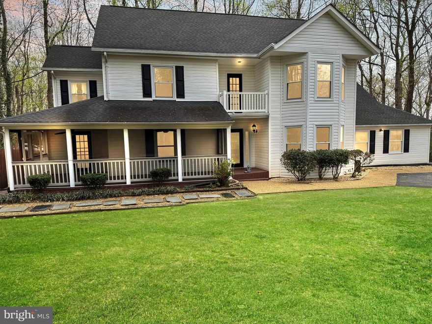 Assumable 2.75% VA Loan with a $350K balance.  Welcome to this beautifully updated home in the highly desirable, gated community of Aquia Harbour, where traditional charm meets refined comfort.  Situated on a peaceful cul-de-sac with minimal traffic, this residence boasts a large, private front yard with mature landscaping and a privacy hedge, ensuring tranquility and seclusion even before stepping inside.

Upon entering the home, you’re greeted by a spacious main level that seamlessly transitions between the kitchen, dining, and living areas. The kitchen is a chef’s dream, featuring custom wood cabinets, stainless steel appliances, a full wall of built-ins, and a large breakfast bar—perfect for casual dining or entertaining. Adjacent to the kitchen is the spacious dining room, which offers exterior access to a large, covered, fully screened front porch—ideal for relaxing and enjoying cool mornings and warm nights.

The main level also includes a large living room with sitting area, a formal living room, a half-bath, and access to the rear deck and 2-car garage. Upstairs, you’ll find generously sized bedrooms, including the large primary suite, which features a spacious walk-in closet, sitting area, and an updated en-suite bathroom with dual vanities and a full tile surround in the shower. The upper level includes two additional spacious bedrooms, a well-appointed full bathroom, and a second-story balcony, completing the upper floor. Fresh paint throughout the home’s first two levels ensures move-in readiness, creating a welcoming and clean atmosphere.

The fully finished, walk-out basement adds even more living space and flexibility, offering a large flex space, a full bathroom, laundry, and ample storage. The basement’s flexible layout also accommodates the creation of a fourth bedroom with an en-suite—ideal for guests, family, or as a private retreat.

Additional highlights include: Updated roof, HVAC, and appliances—all less than 5 years old—along with a 2-car garage, storage shed, and backyard gazebo.

Nestled within the highly sought-after Aquia Harbour community, residents enjoy access to a wealth of amenities, including  a golf course, marina, stables, 7 parks, walking trails, sports courts and more! With easy access to I-95 and proximity to Quantico, this neighborhood is perfect for those commuting north or south.

Don’t miss the opportunity to own this exceptional home!