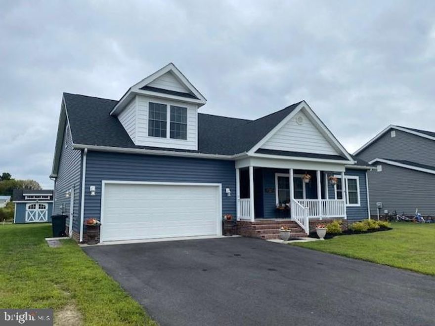 This is the home you have been waiting for.  Perfectly located in the Woodland Manor Community of Pocomoke.  Close to local schools, restaurants, and shopping.  Includes four bedrooms and two full bathrooms.  Open floorplan kitchen, living room, and dining room.  Lots of high end features...such as granite counter tops, luxury VP flooring, and stainless steel appliances.  Upstairs includes the four bedroom that is great for an office or as an additional room for sleeping.  Large walk in attic space has plenty of room for storage.  Located on a small pond which often gets visited by local wildlife.  Paved driveway and cute little shed on site.  Two car attached garage in addition to the driveway.  Community has sidewalks for your convince.  Located approx. 30 minutes from NASA/Wallops Flight Facility.  Not much further to Chincoteague and Assateague Island, Va.  Also about 30 minutes to other great destinations such as Ocean City to the northeast and Salisbury to the north.  Great location with lots of options close by.  Home was new in 2021 but has been gently lived in.