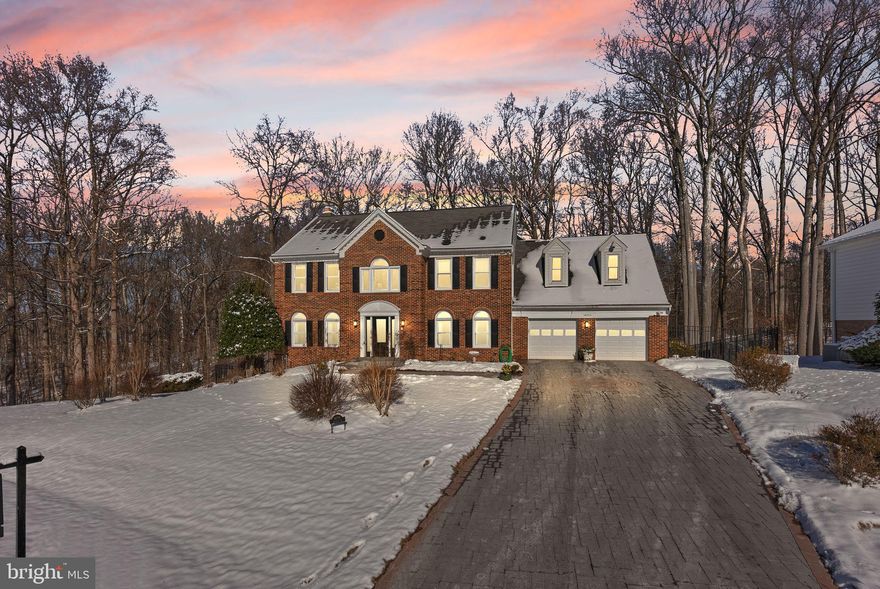 Welcome home to 14725 Jaystone Drive, a meticulously maintained colonial gem in the highly coveted Naples Manor neighborhood. Boasting 5 bedrooms and 3.5 bathrooms, this residence exudes pride of ownership at every turn.

As you step inside, the gleaming hardwood floors guide you through a captivating journey. A grand spiral staircase welcomes you, setting the tone for the elegance that unfolds within. Two fireplaces add warmth and charm, creating inviting spaces for relaxation and entertainment.

The heart of this home is the updated kitchen, where a breakfast bar, beautiful granite countertops, refinished cabinets, and sleek appliances seamlessly come together. Connected to a rear vinyl deck, this culinary haven offers a picturesque view of the serene backyard, making it an ideal spot for morning coffee or evening gatherings.

Upstairs, a beautiful and spacious primary suite awaits, featuring an updated bathroom and an executive-style office. Three additional bedrooms share another full bath, providing comfort and convenience for family and guests.

The versatile finished walk-out basement is a true highlight, featuring hardwood floors, a full bath, and two bonus rooms—one of which qualifies as a 5th bedroom. Step outside to a custom-covered patio, extending your living space into the outdoors.

Experience the enchanting glass-enclosed sunroom with panoramic views of the private, wooded rear yard—a perfect retreat for relaxation and enjoyment. The fenced backyard, adorned with black ornamental and chain-link fencing, offers both privacy and elegance. A gate in the rear leads to the woods and a creek below, adding a touch of nature to your surroundings.

The exterior exudes sophistication with a beautiful paver driveway and a brick-pillar mailbox. Professional landscaping ensures the yard is a visual delight, meticulously detailed to perfection.

Immerse yourself in the charm, comfort, and security of Naples Manor living in this thoughtfully crafted residence. Welcome to a home where every detail has been carefully considered to offer you the ultimate in both luxury and practicality.